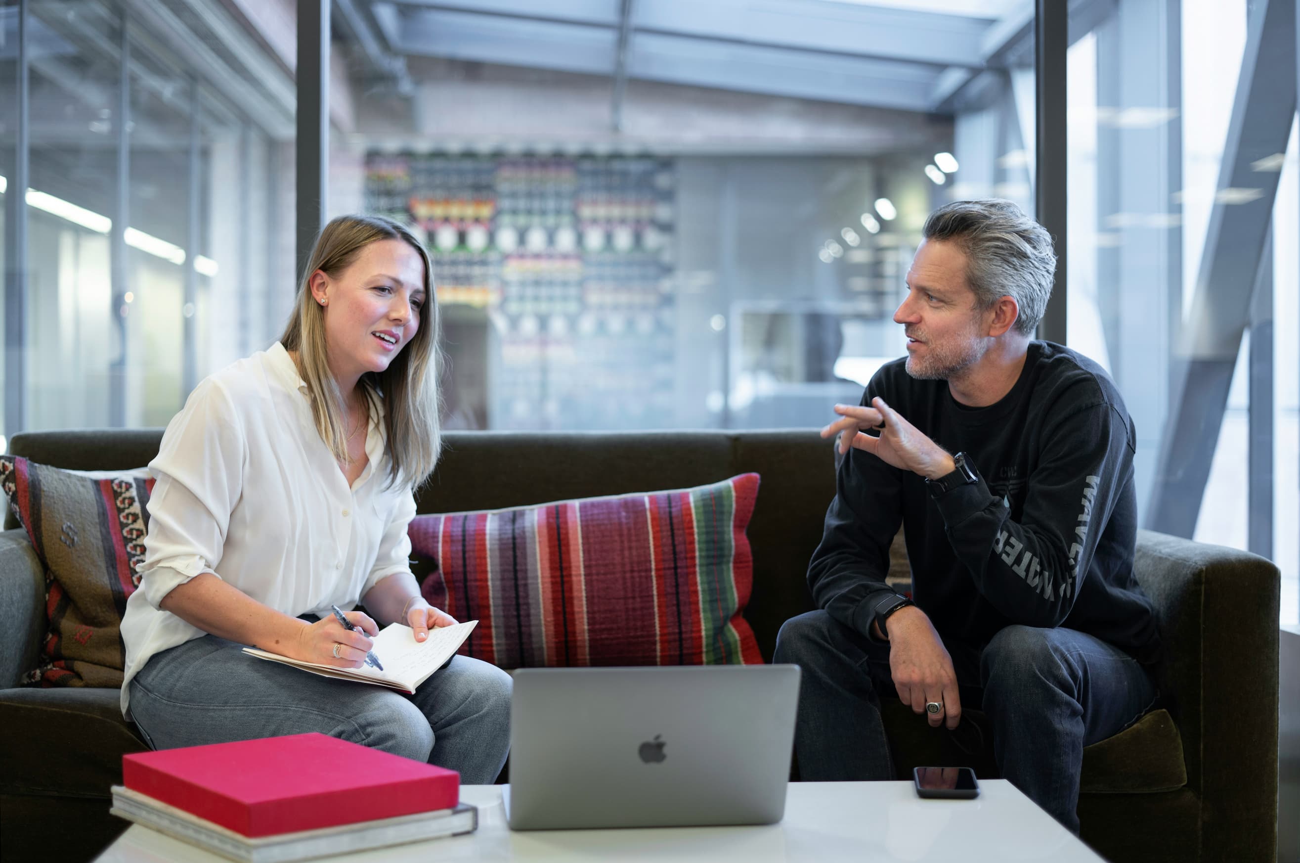 Founder and advisor discussing cultural resilience during restructuring