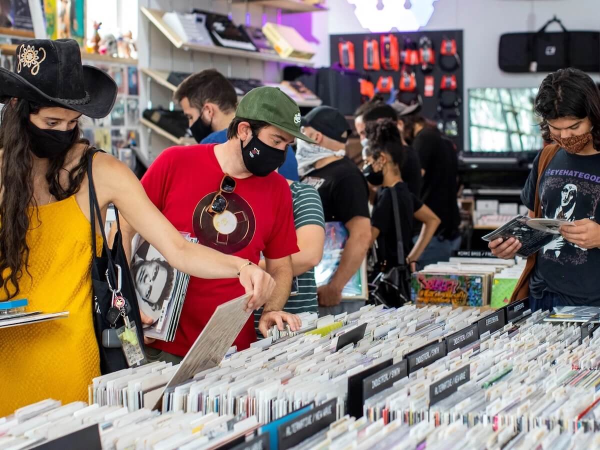 people looking through vinyl records