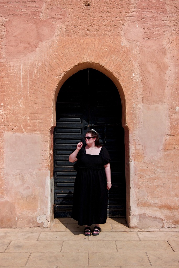 Loz in front of a doorway in Marrakech