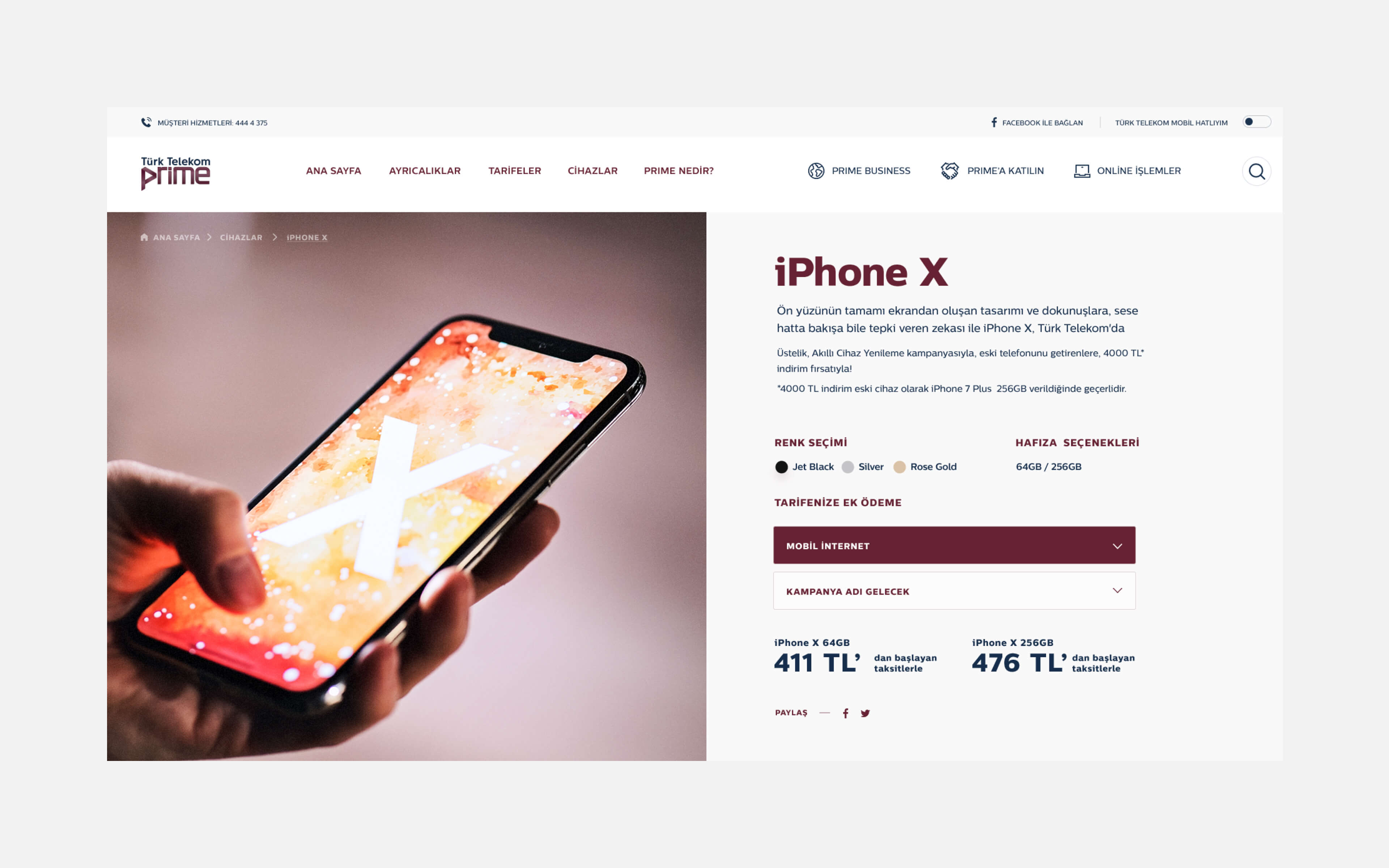 Close-up of hand holding iPhone X with vibrant display, showcasing sleek design on Turk Telekom Prime product page with storage and pricing info.