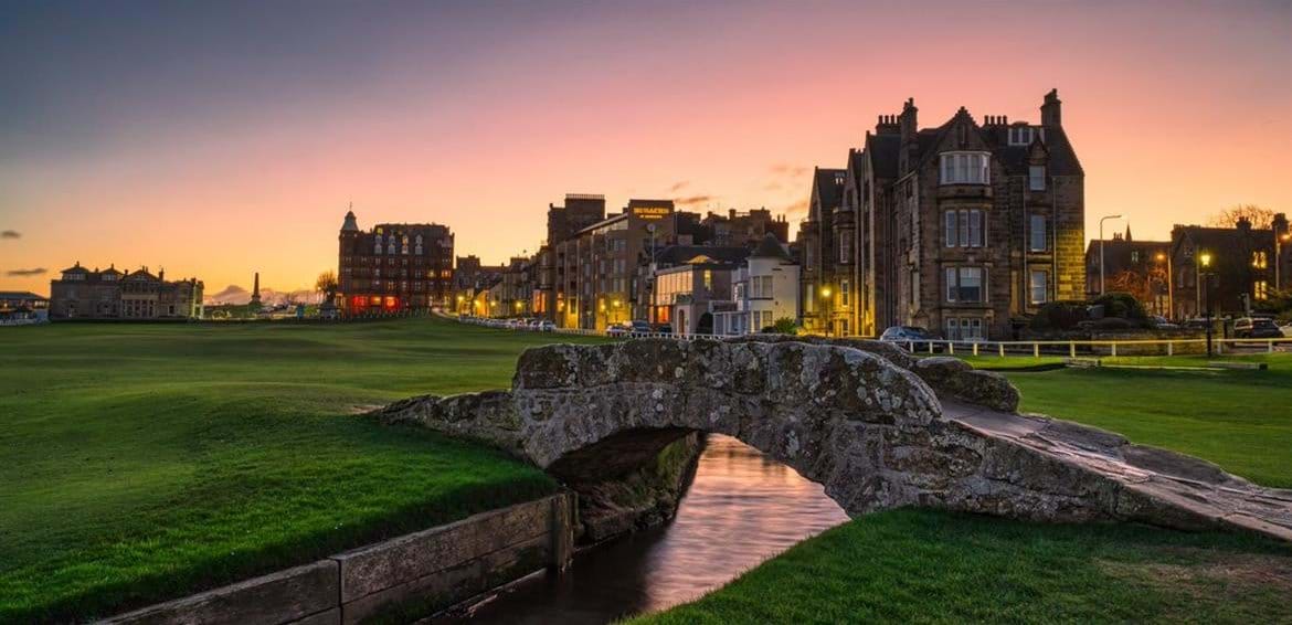 sun setting over the swilican bridge in st andrews