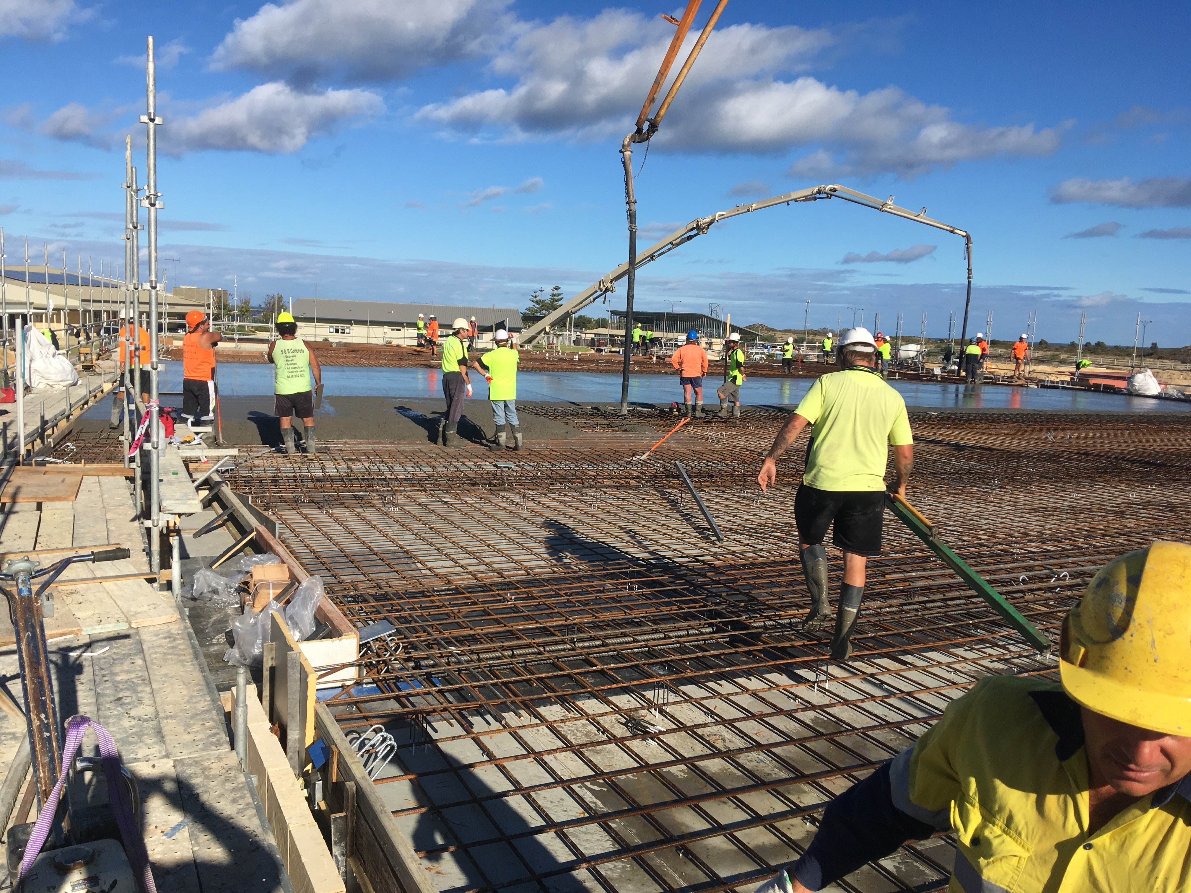 Close-up of a vintage car's blue fender with turn signal.