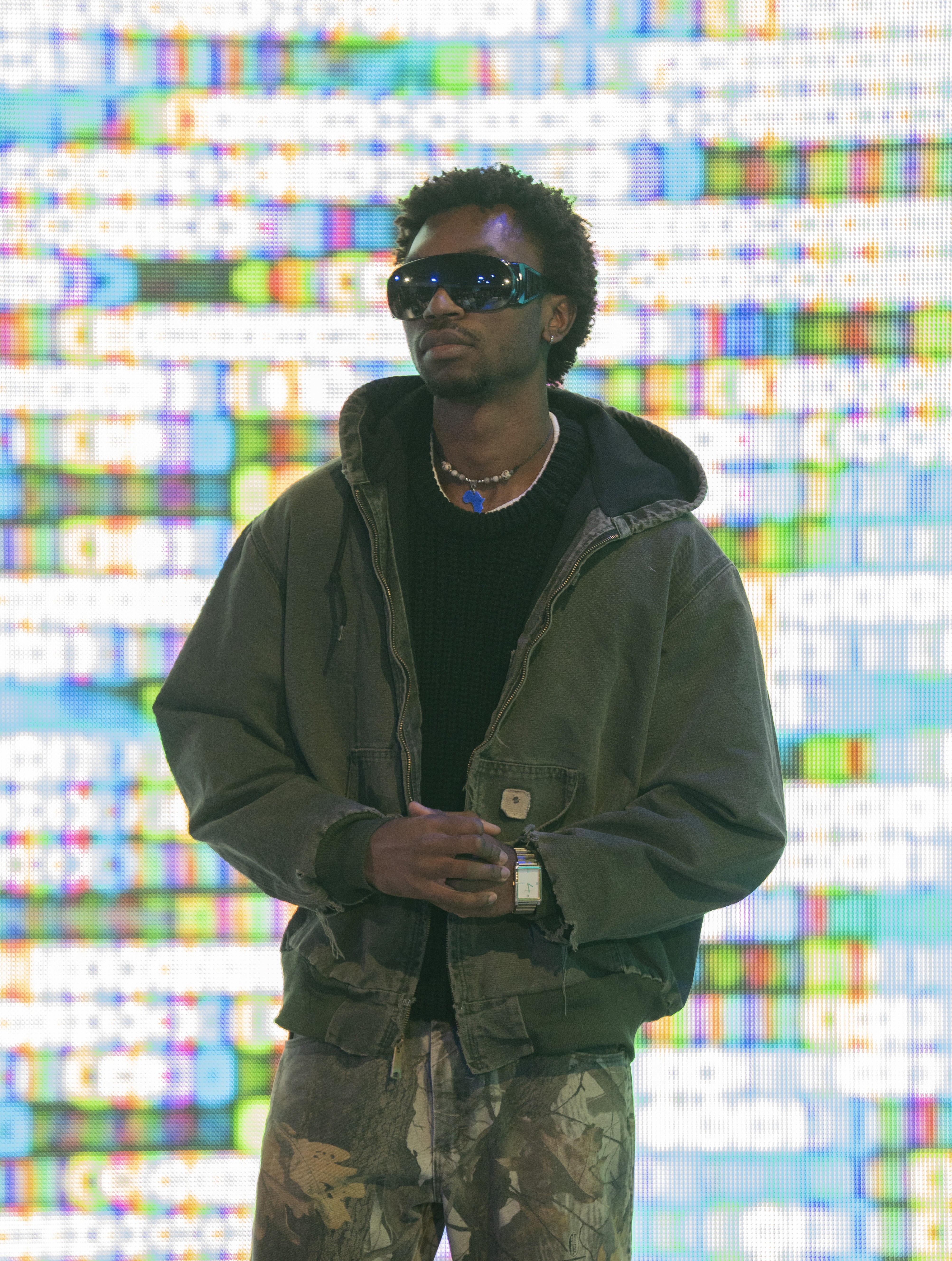 a man holding a cocktail