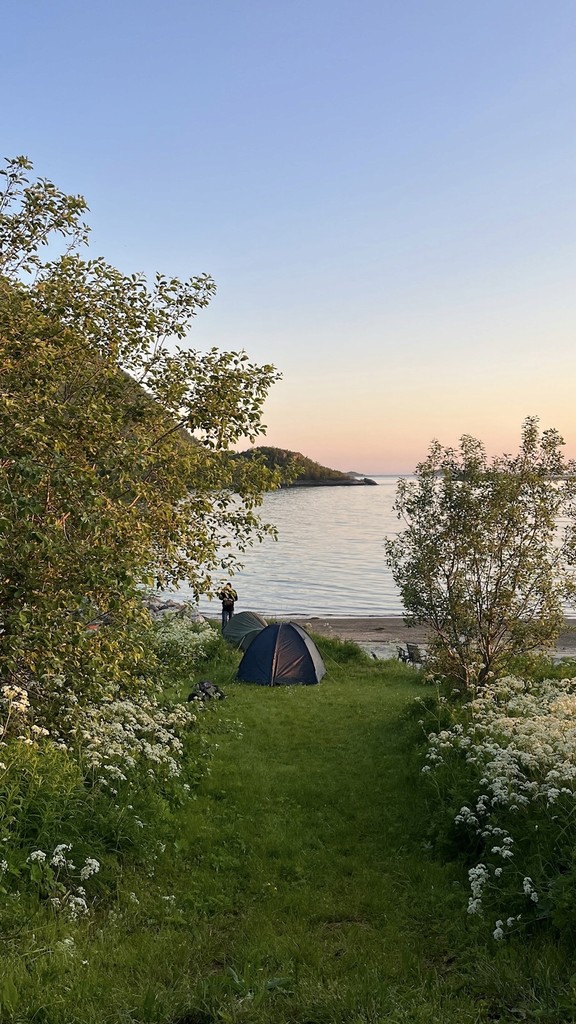 A tent beside the water