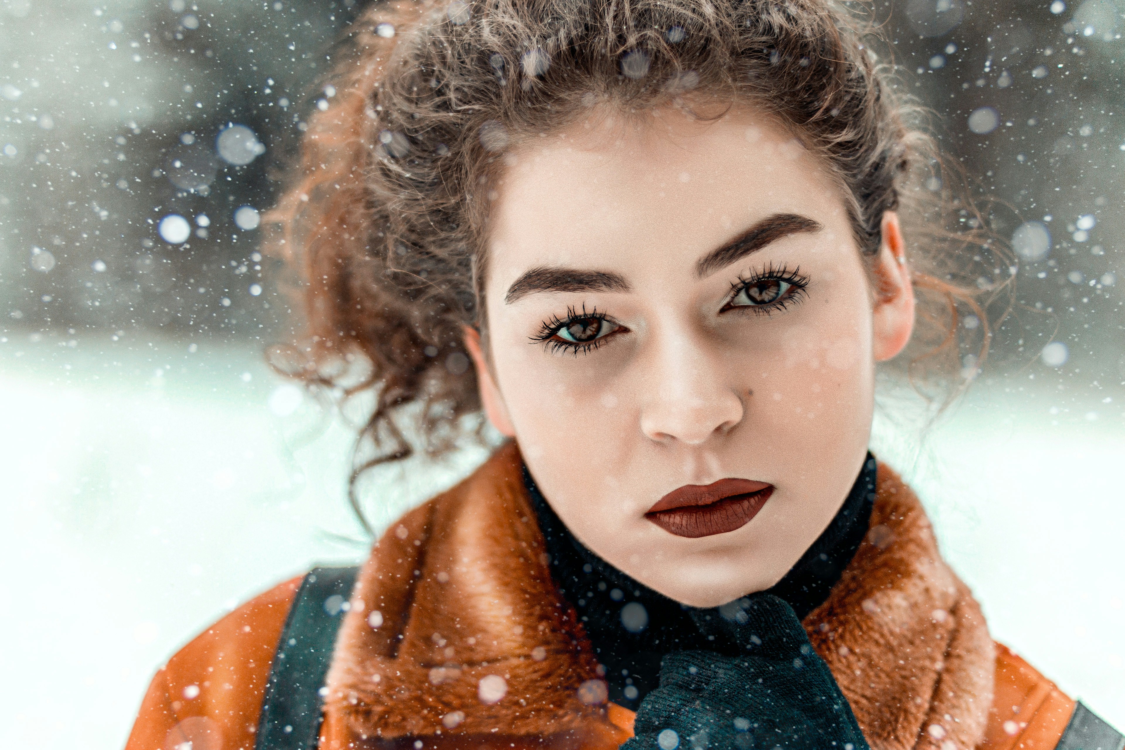 Girl Posing in Snow -  Best Colors for Winter Skin Tone