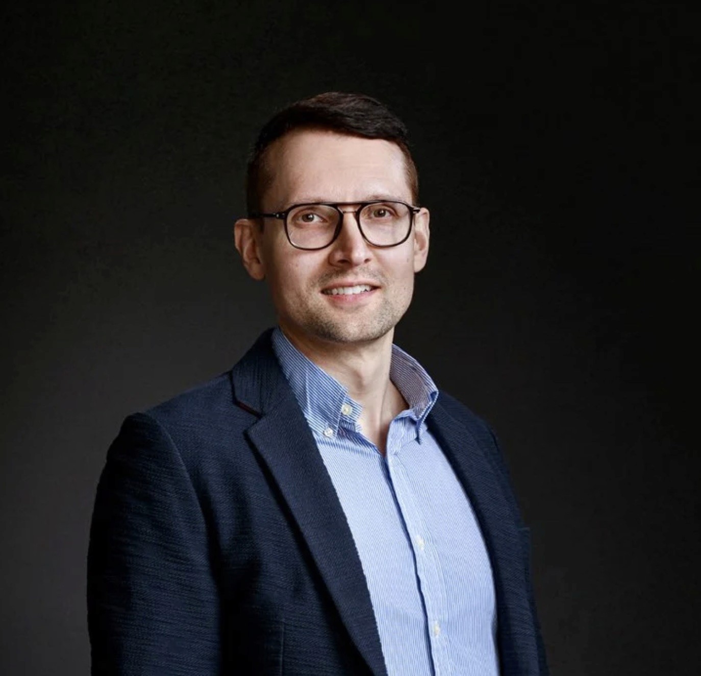 Group of men standing with Sufboard