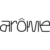 Silhouetted agapanthus flowers against a gradient sky.