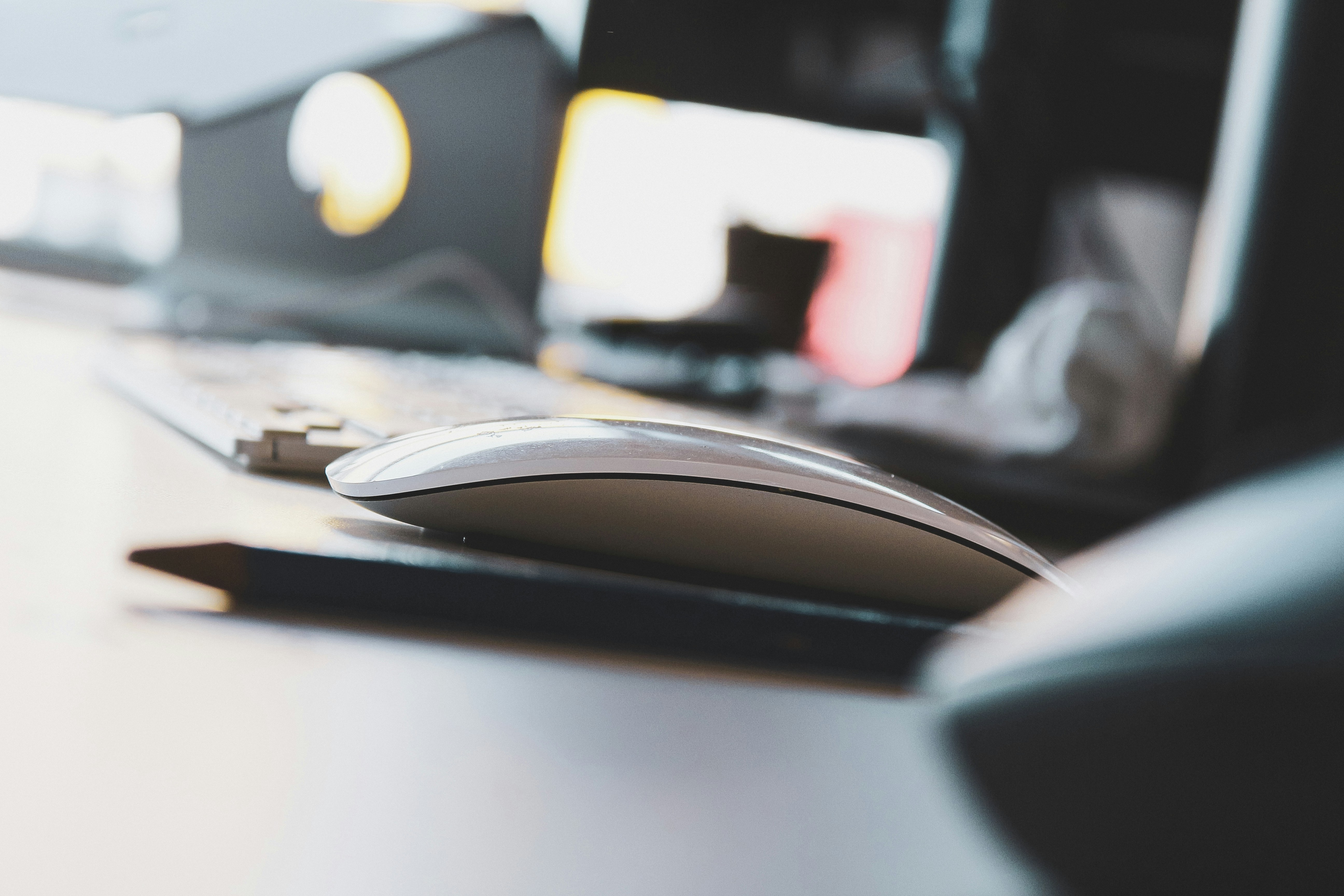 a desk with mouse and keyboard - gmail filter for multiple email addresses