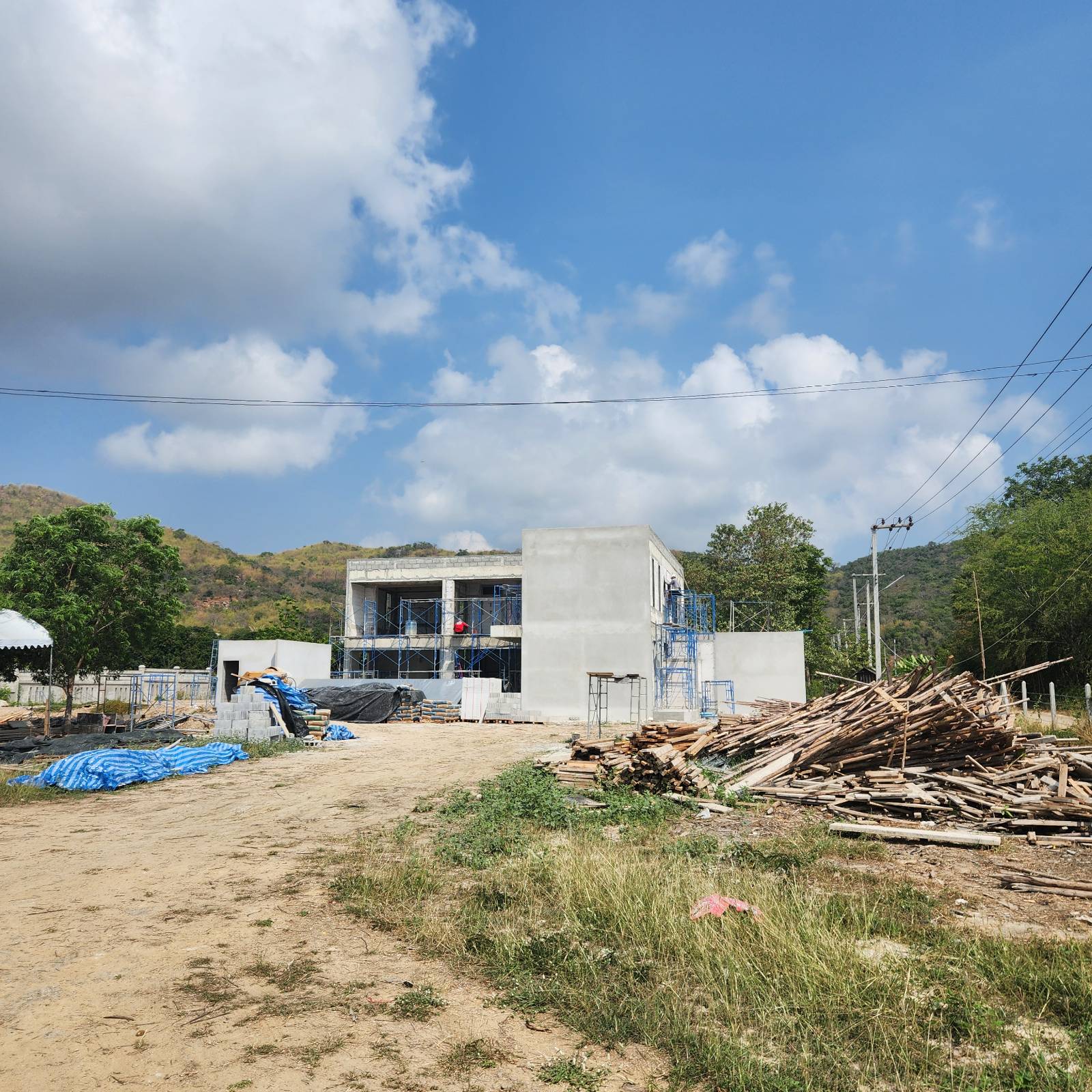 Villa taking shape with mountain backdrop