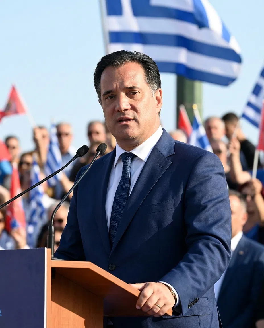 Adonis Georgiadis speaking publicly in a political setting.