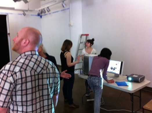 people working on the Ideopolis exhibition preparations