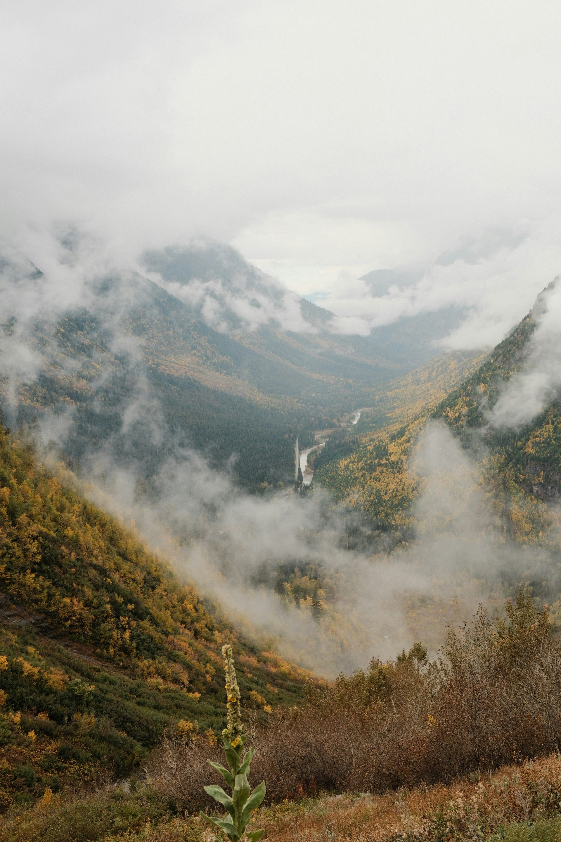 A mountain landscape with clouds