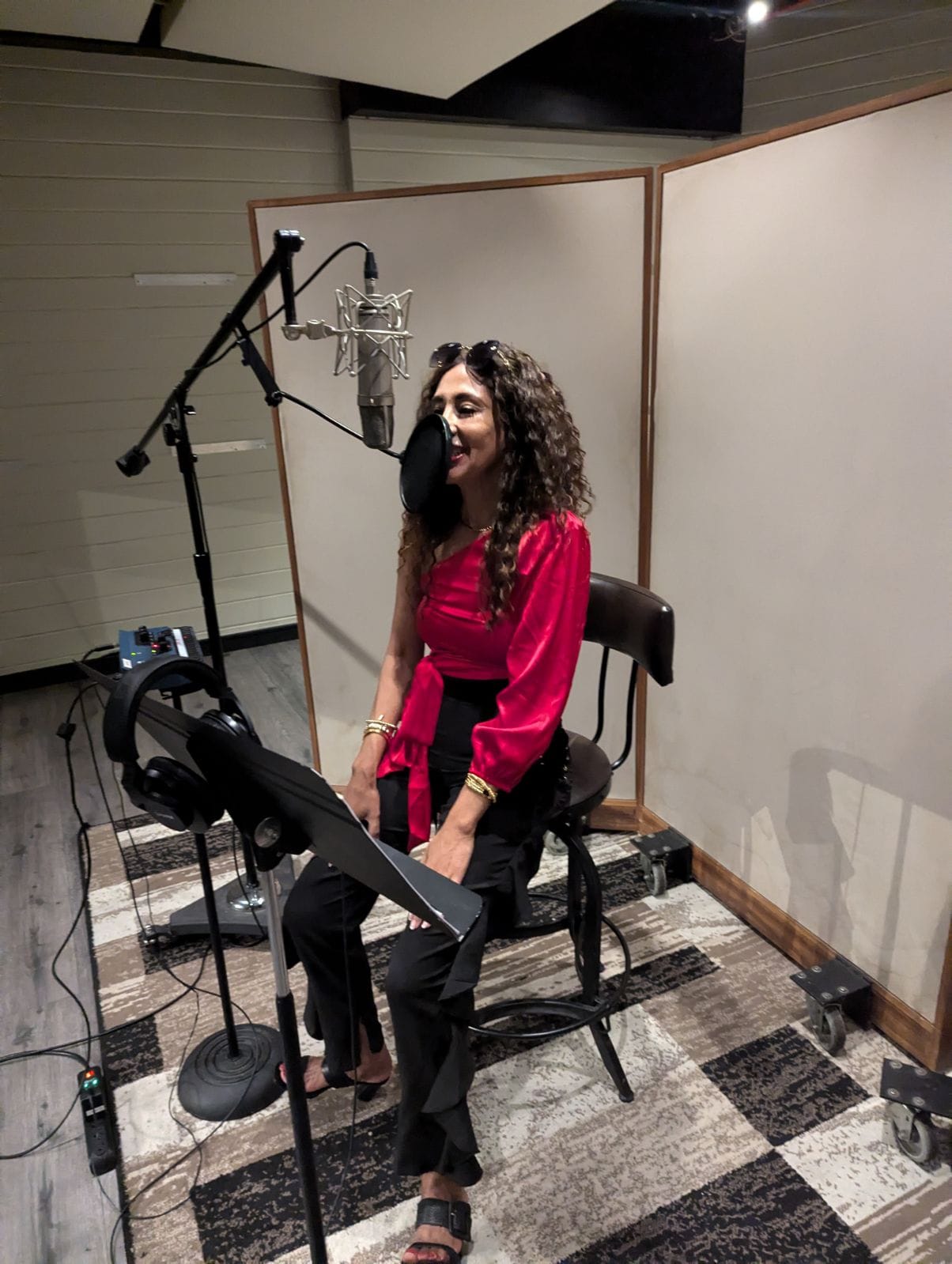 Music producer sitting in his studio