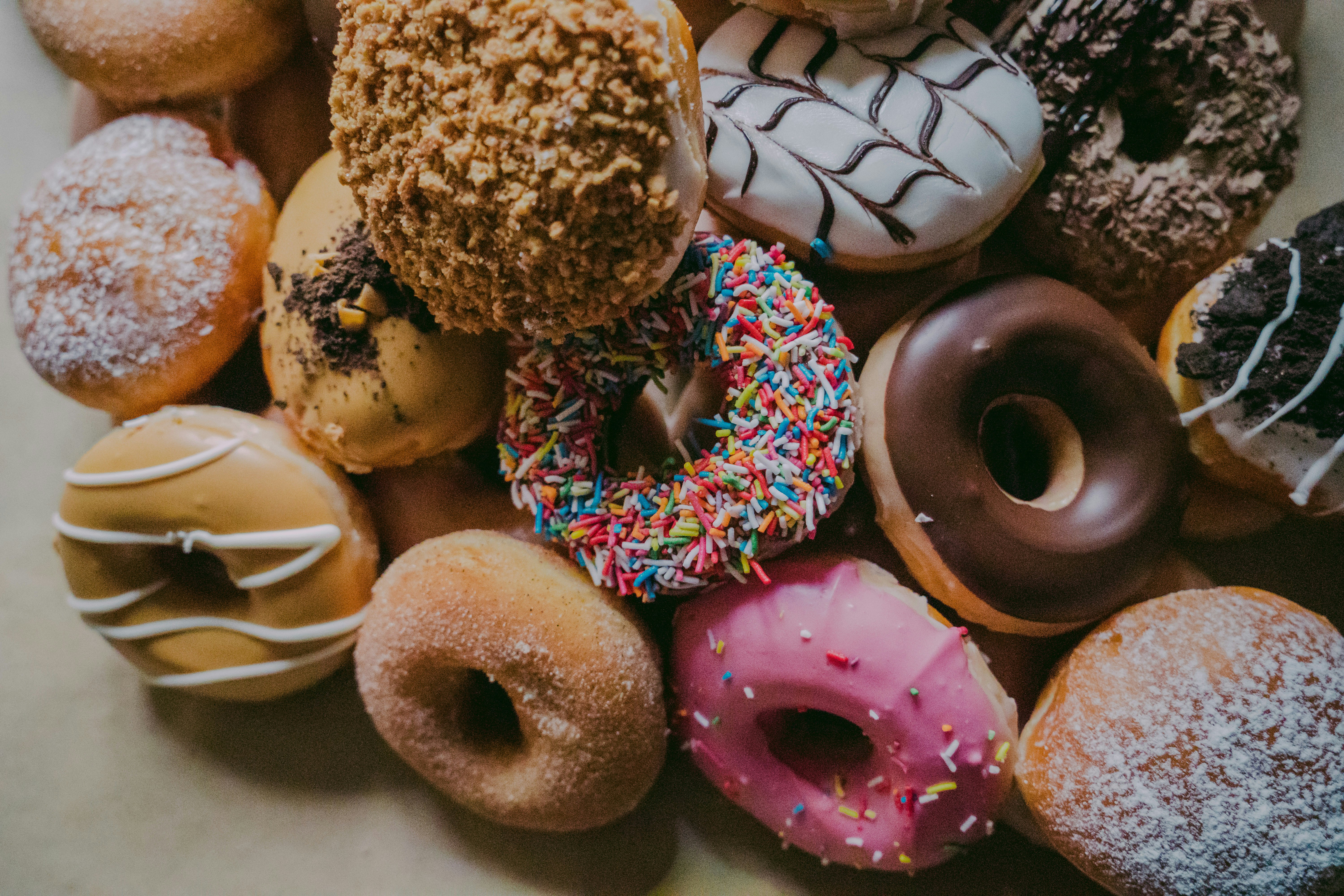 Bunch of mini donuts with different glazing