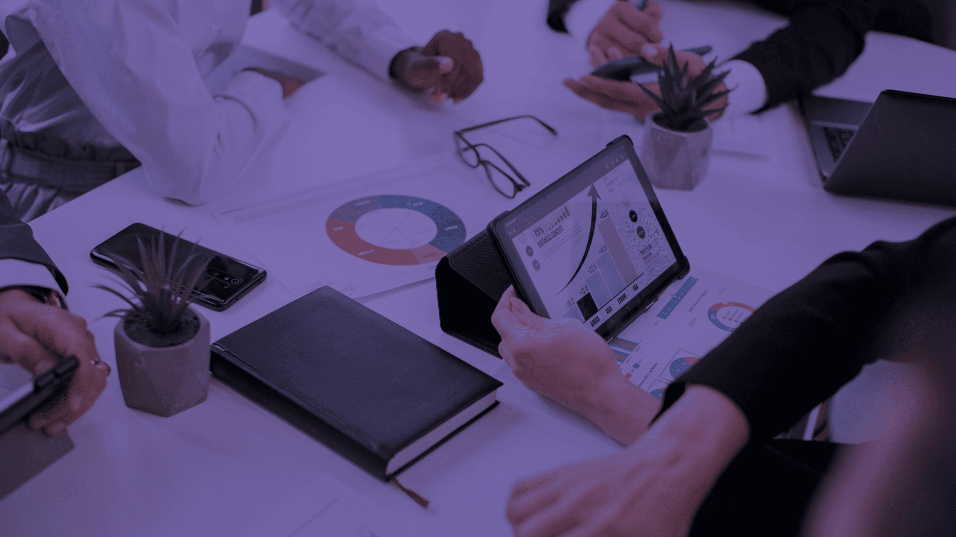 a person writing on a piece of paper