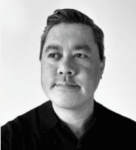 Man smiling in an office