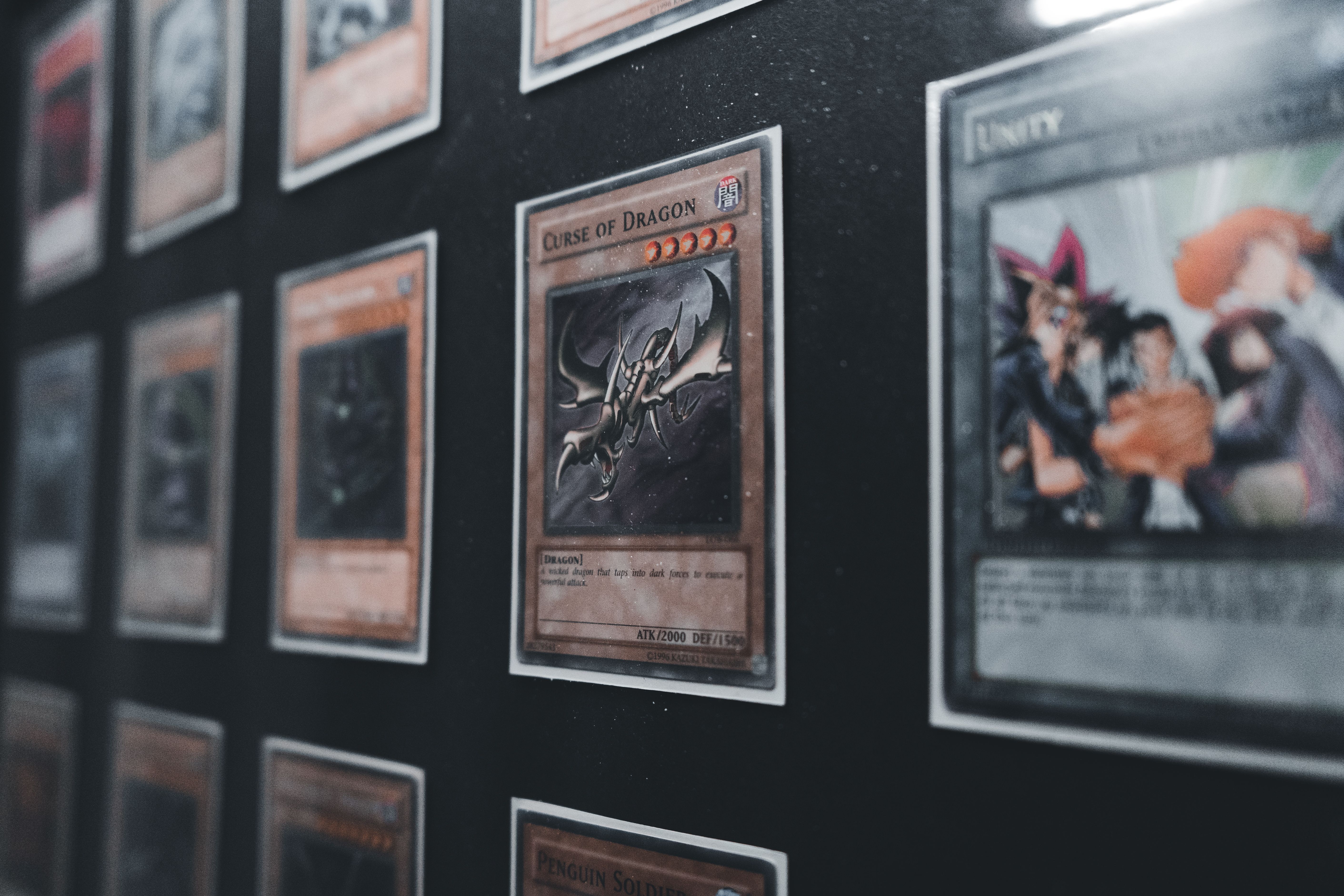 a-close-up-view-of-yu-gi-oh!-trading-cards-in-a-display-case-showcasing-rare-and - erik-mclean (pexels)