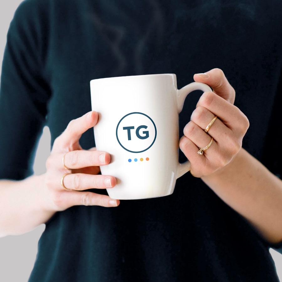 Mug with the Towbes Group logo.