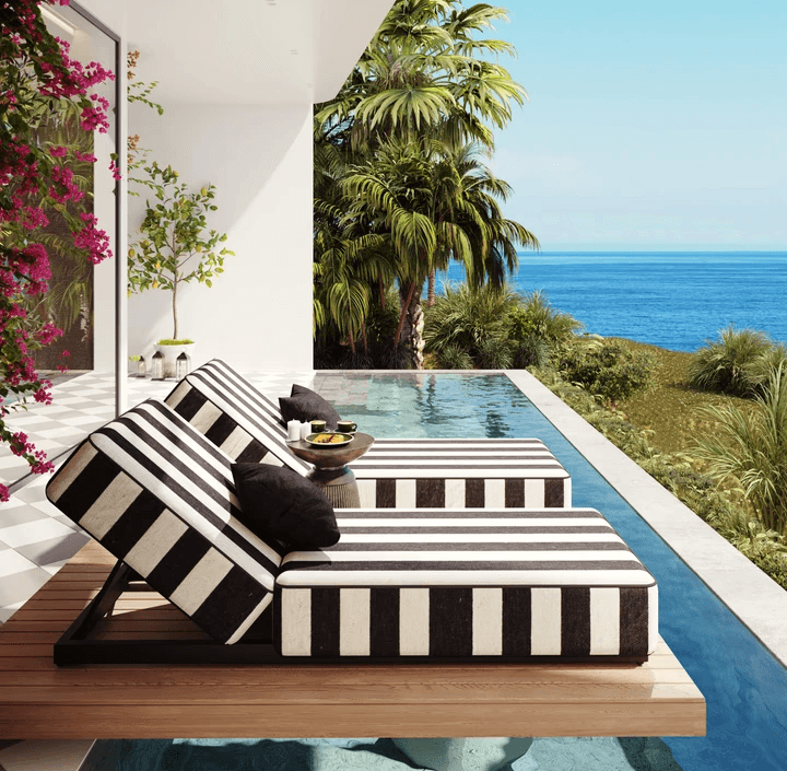 A bedroom with a large bed and a sliding glass door