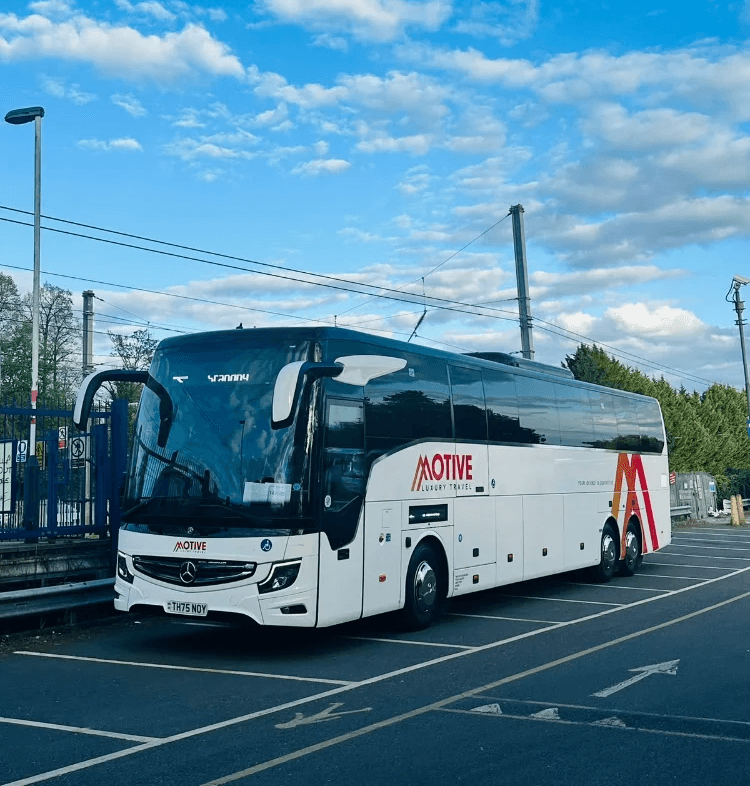 Luxury coach and minibus fleet used for city tours and private transfers, showcasing premium travel services and modern design in urban and scenic environments