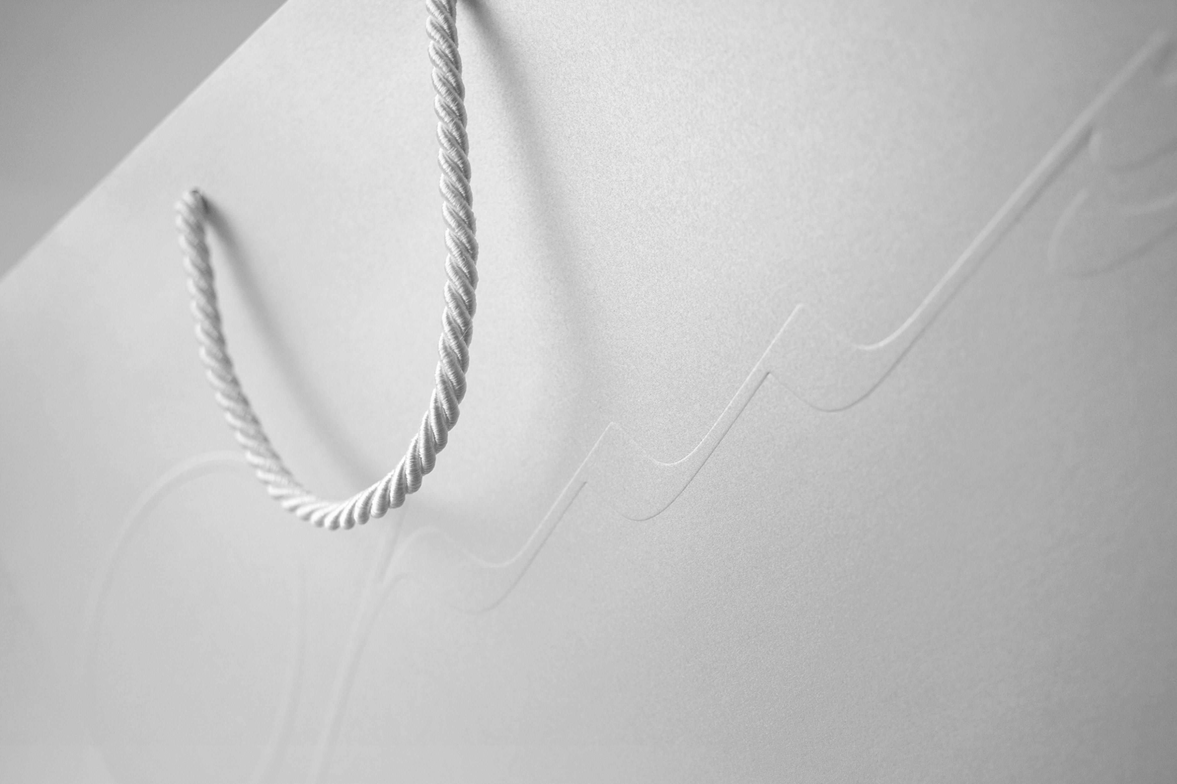 Streetside billboard with flyposters of the Batch.Works brand and illustrations