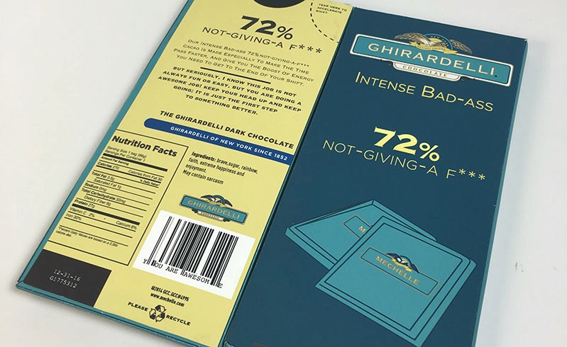 A chocolate blue and yellow packaging cover with text Ghirardelli on it.