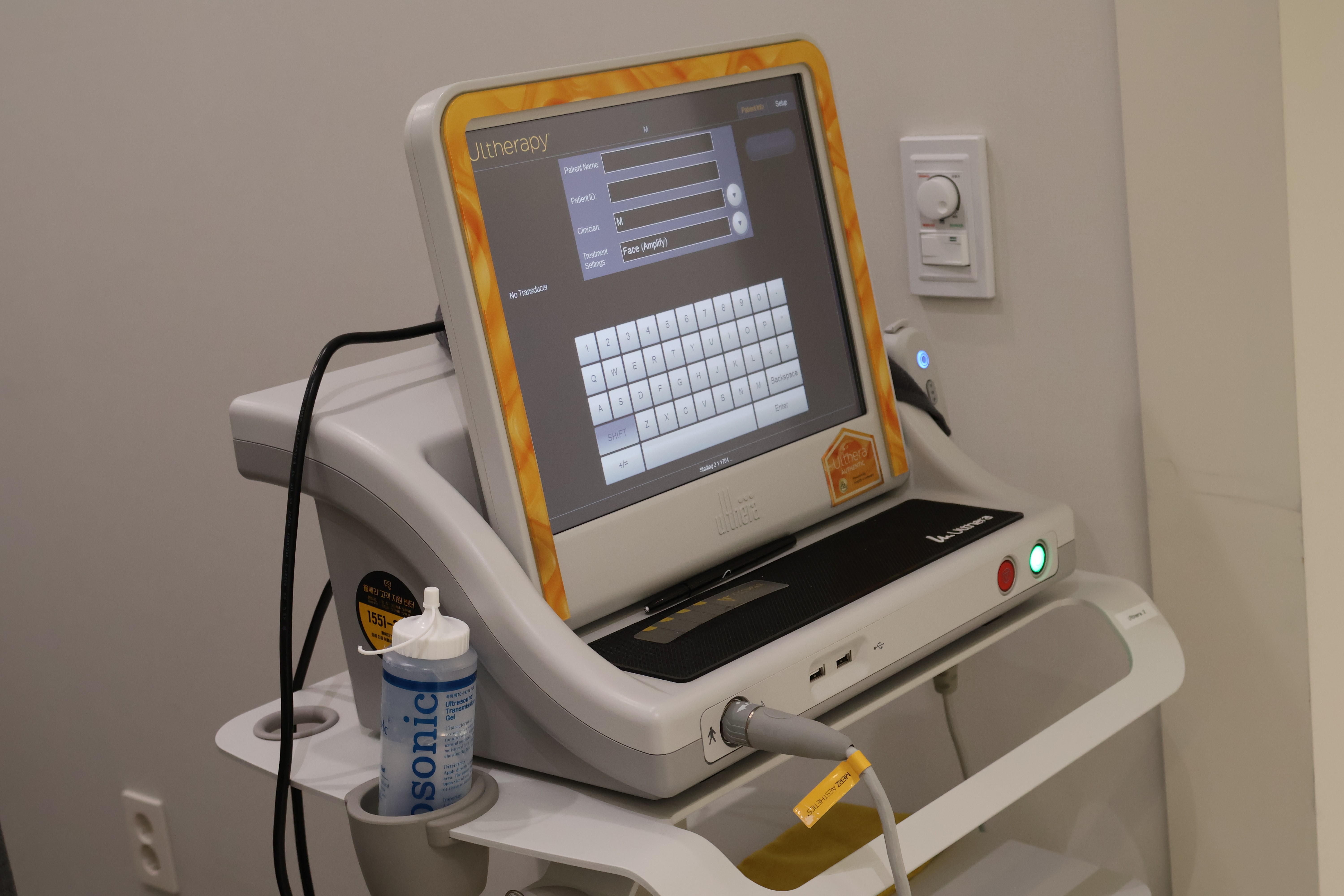 Ultrasound therapy device with touchscreen interface.