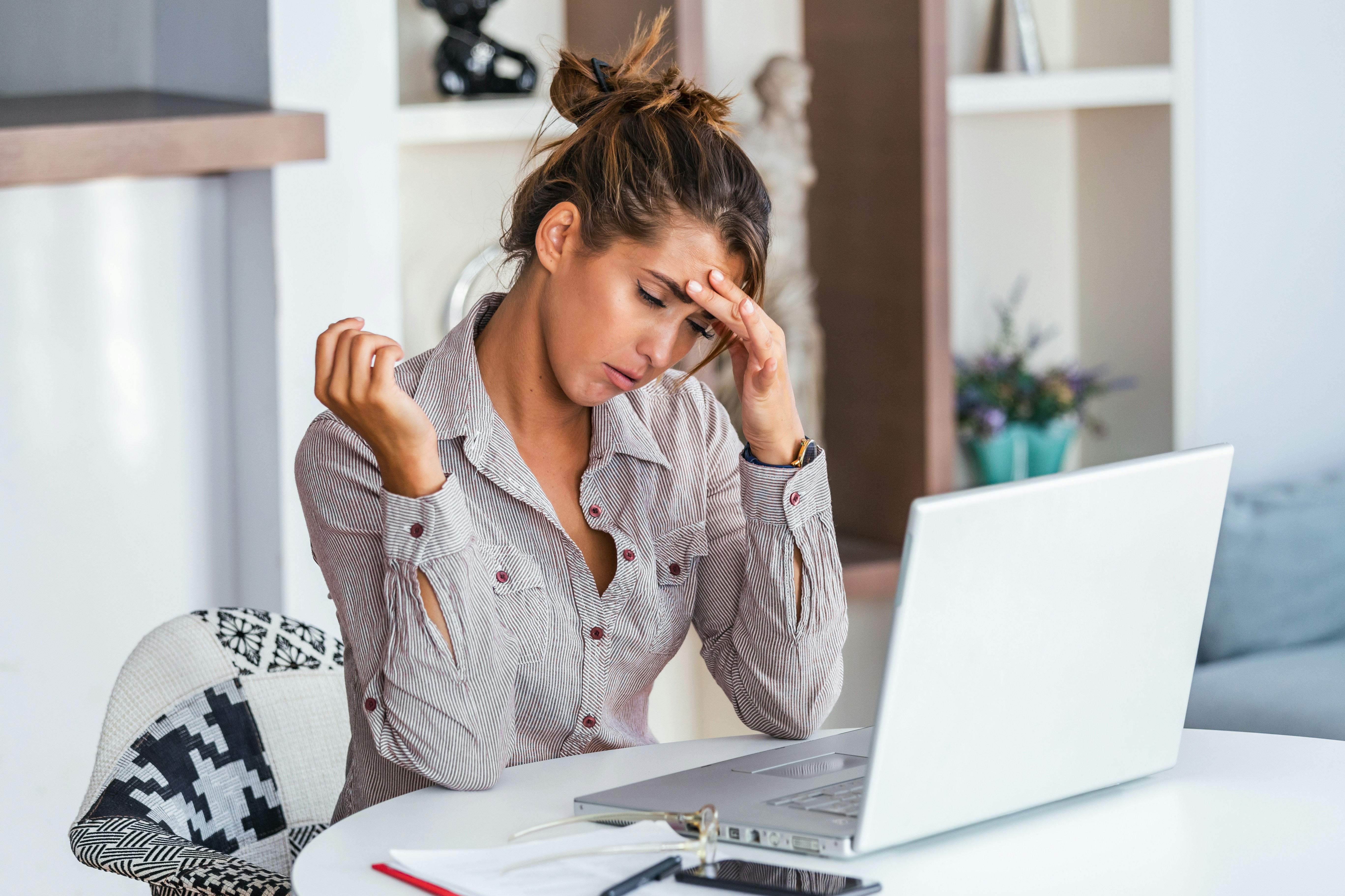 woman writing using pen