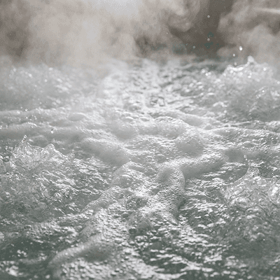 A boat in the middle of a body of water