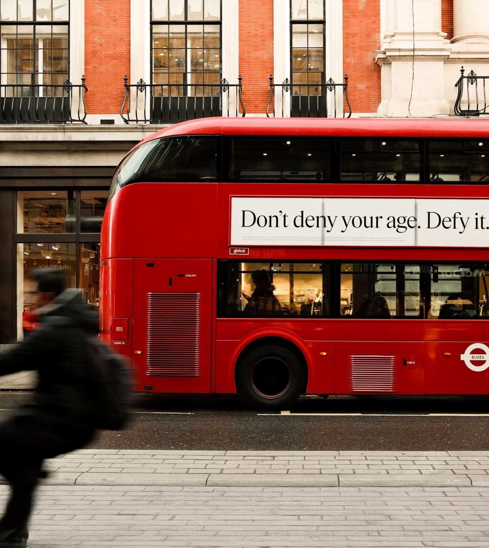 two ladies looking at a laptop and smiling