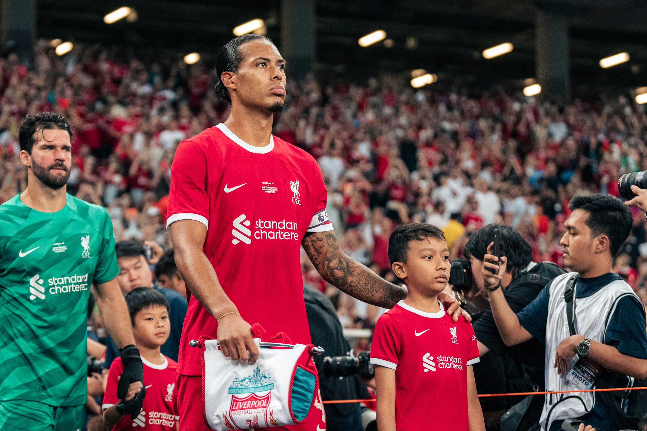 Van Dijk and Alisson of Liverpool walks out during the Singapore Festival of Football 2023, photographed by Edmund Wong