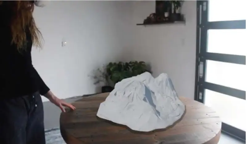 The mountain on a round table in a room