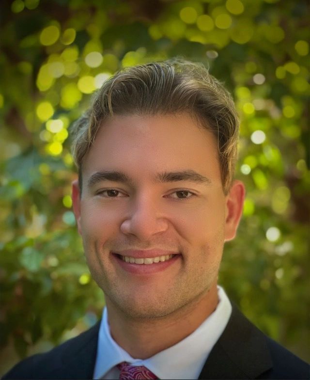 a black and white living room with a large tv