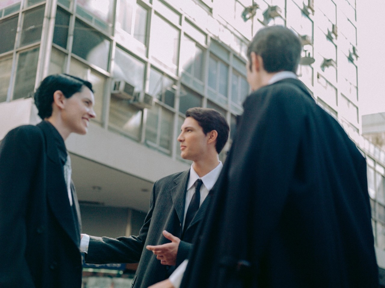 people standing inside city building