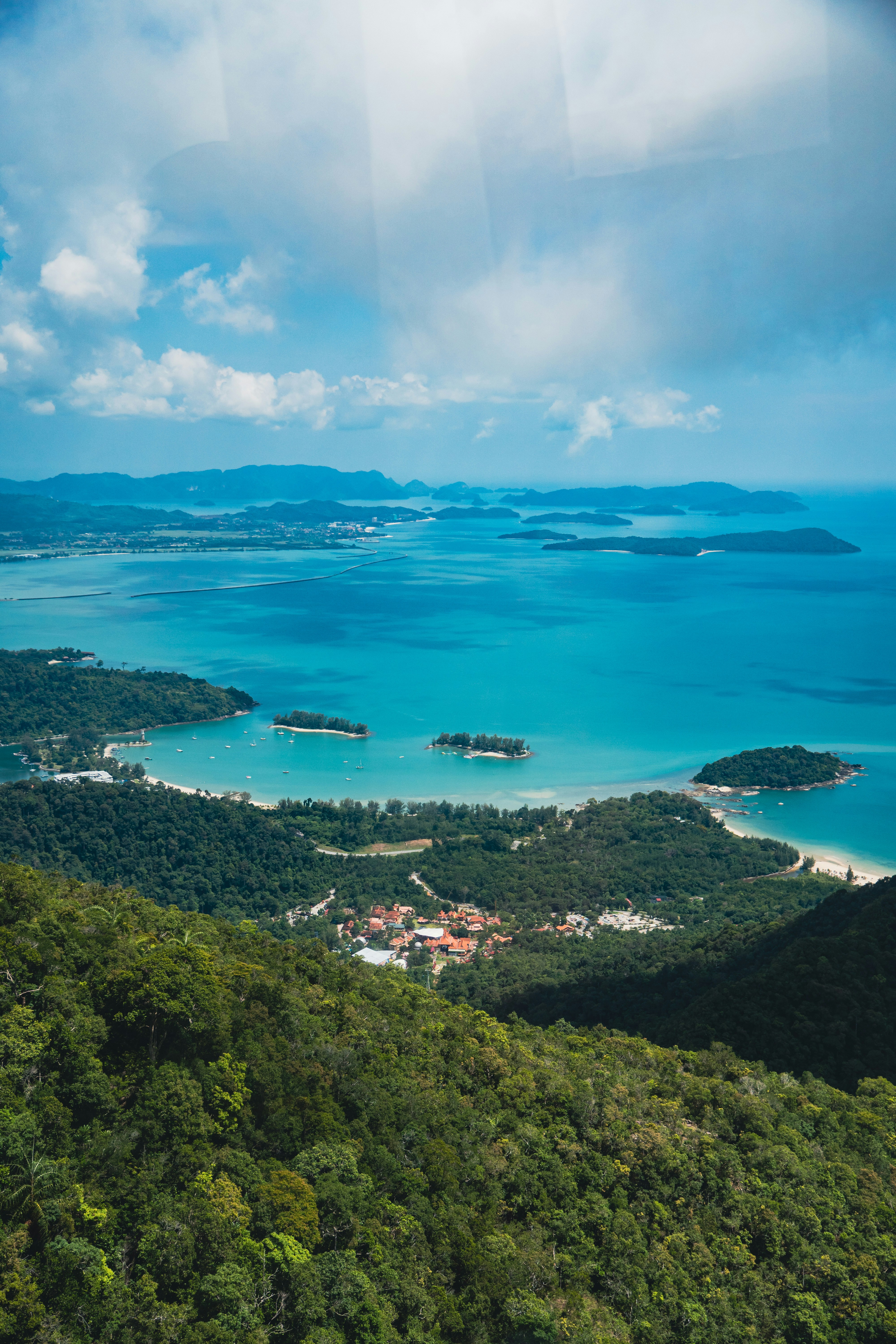 a view of the ocean from a hill