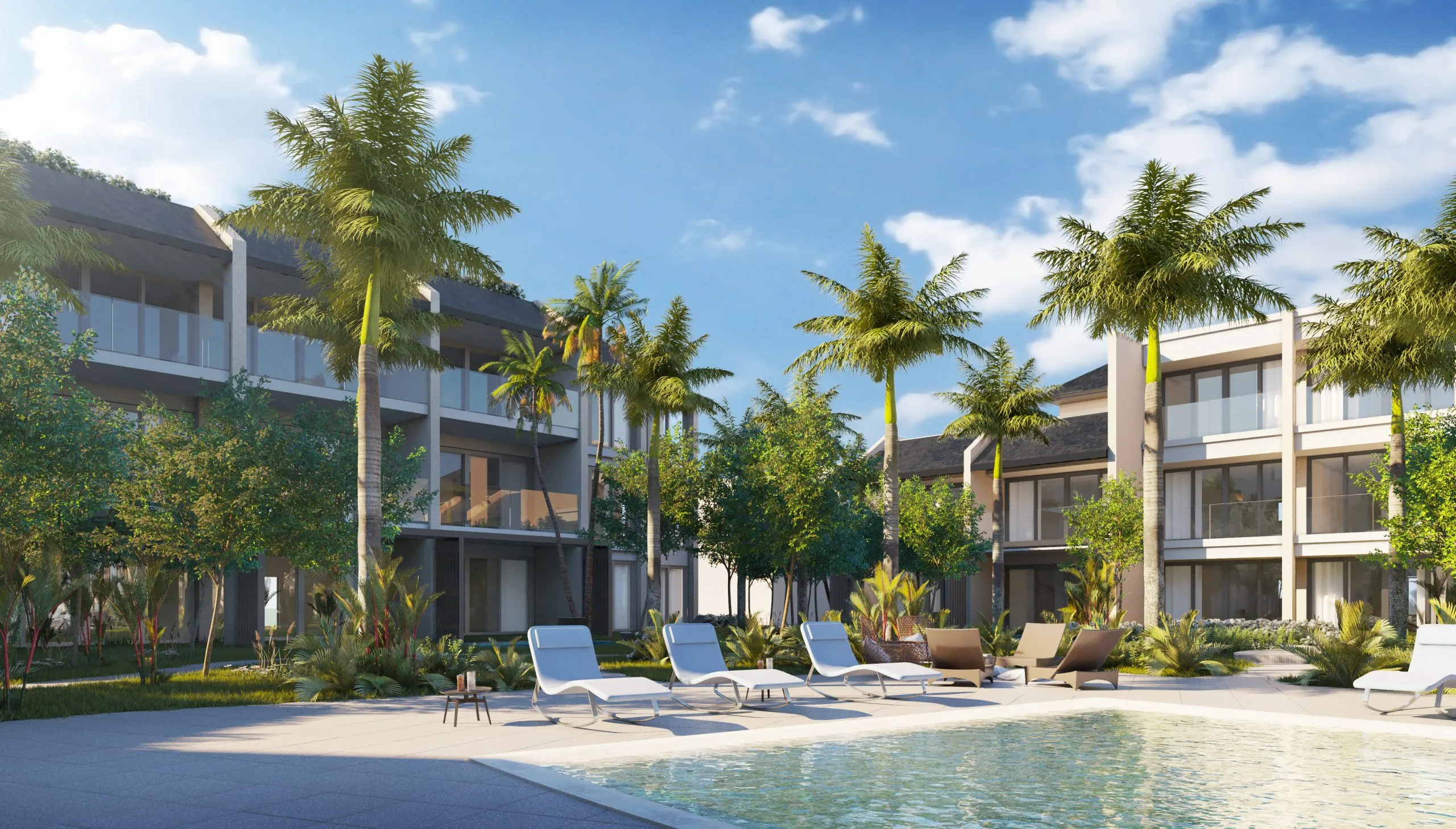 Resort pool deck with sun loungers and tropical landscaping, Bay Gardens St. Lucia