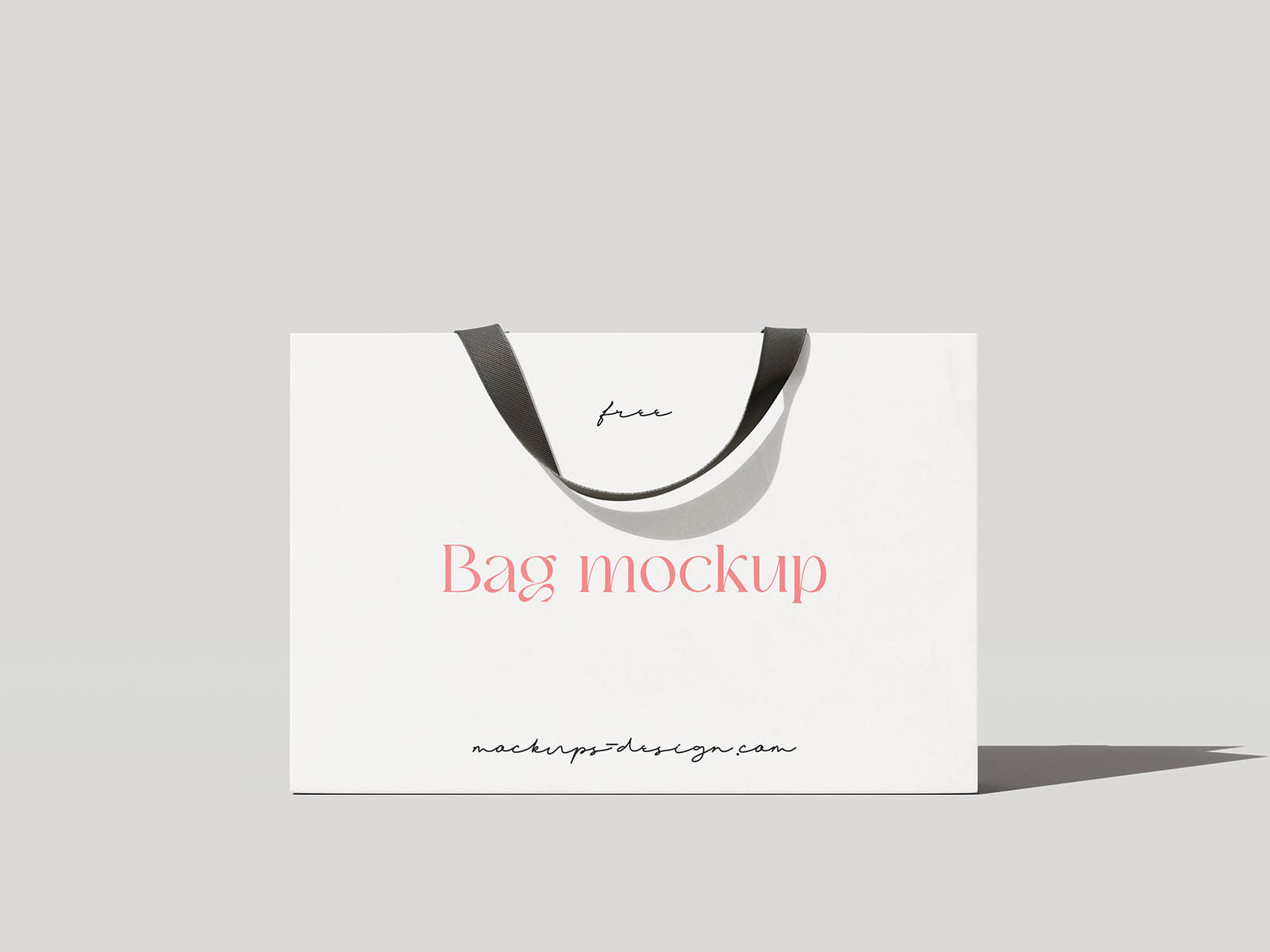 A refined mockup of a paper shopping bag with fabric handles, ideal for showcasing branding for fashion boutiques, cosmetics, or lifestyle products. The set offers four different PSD views—from front and side to angled shots—capturing the natural shadows and soft paper texture with realism. It’s a perfect choice for designers who want to present packaging designs in a polished and minimalistic setting. Easily customizable with smart objects to match any brand identity.