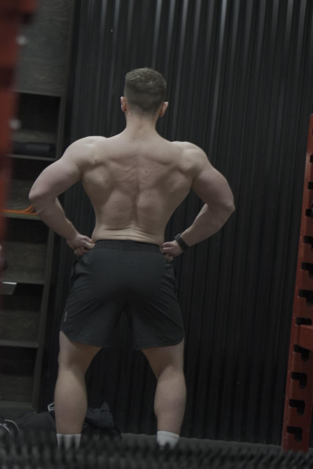 Rachel Stone standing with ABS and hands in her pockets