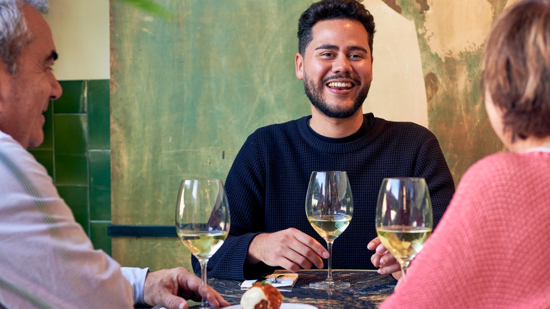 Sommelier guiding guests during a small-group wine tasting experience in Barcelona.