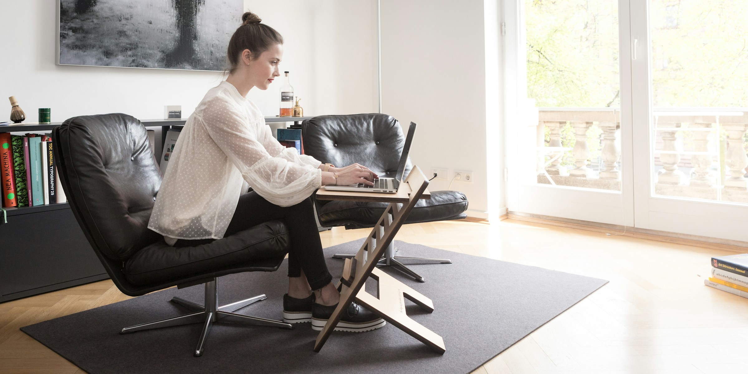 person sitting on chair - Is Good Posture Attractive