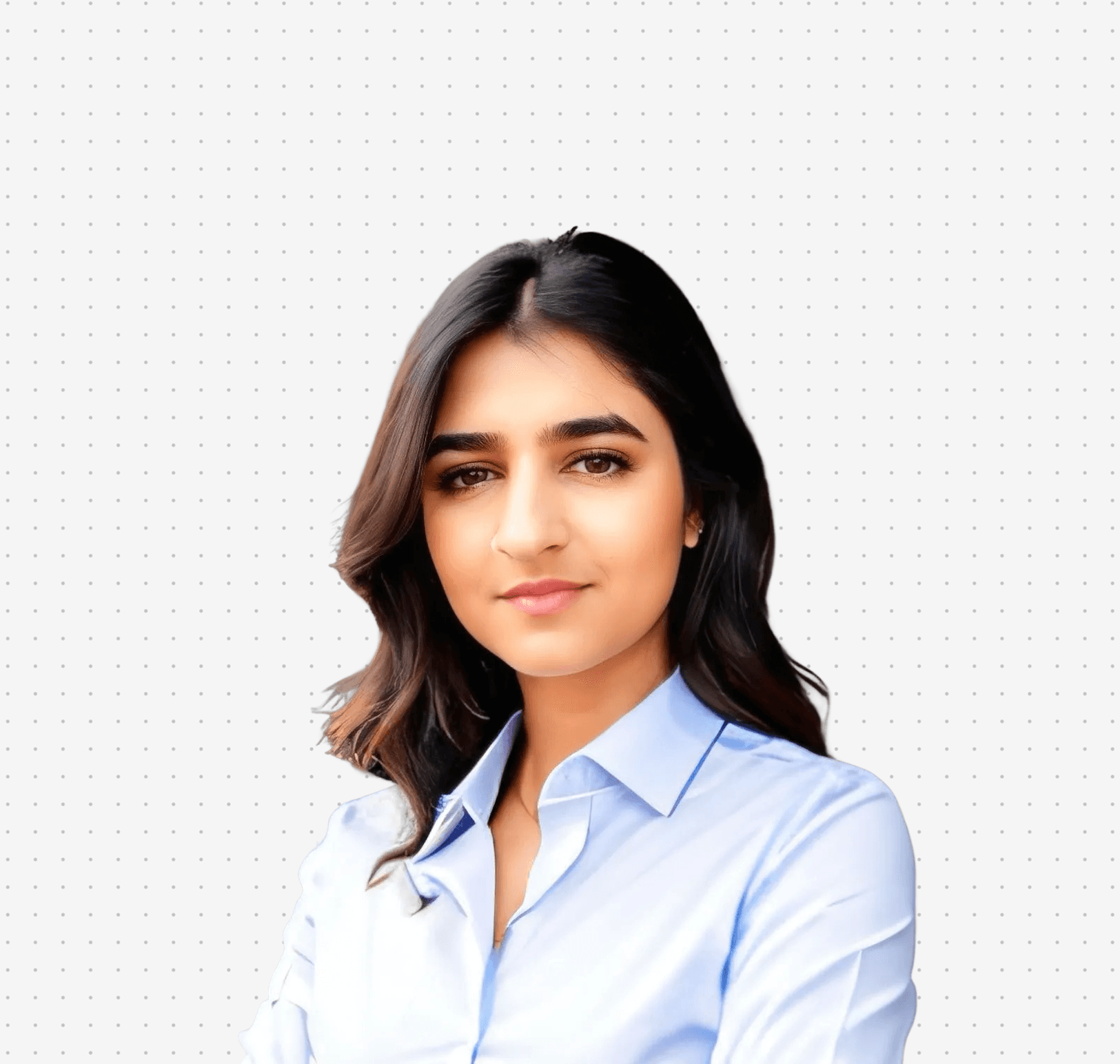 Person wearing a blue puffer jacket and red backpack standing in front of a light blue building on a city street.