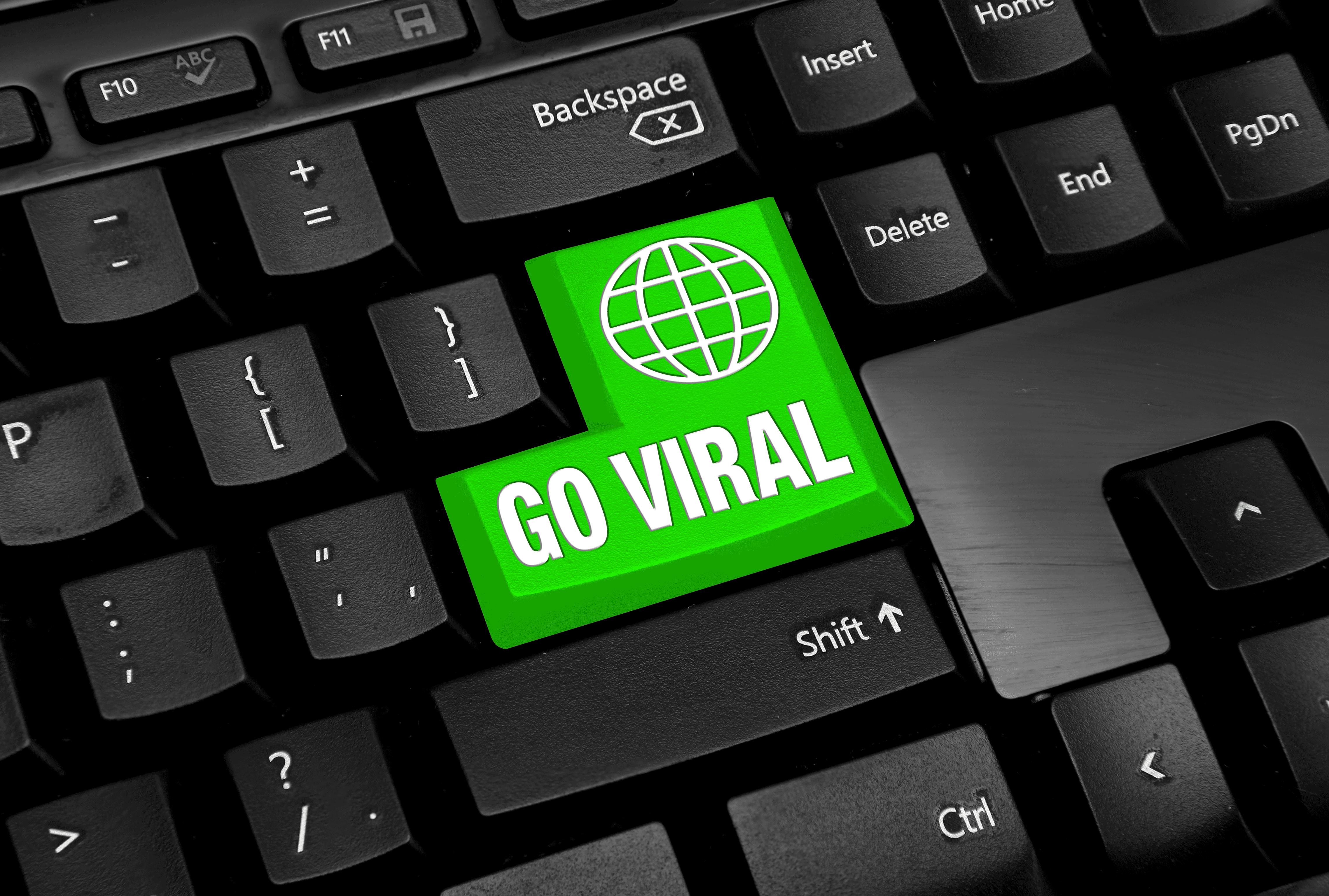 Keyboard with key that says "GO VIRAL"