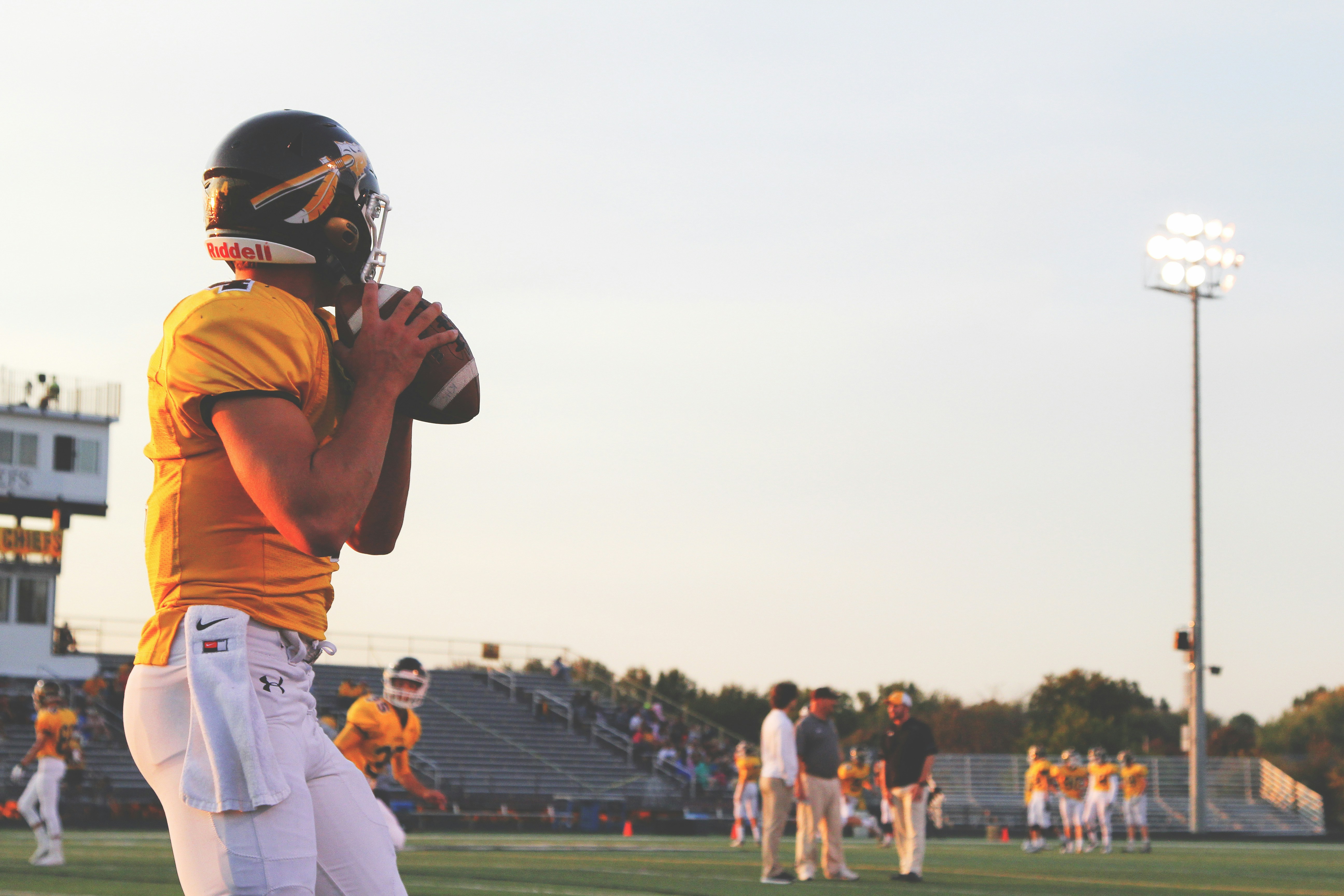 A football play about to throw a ball