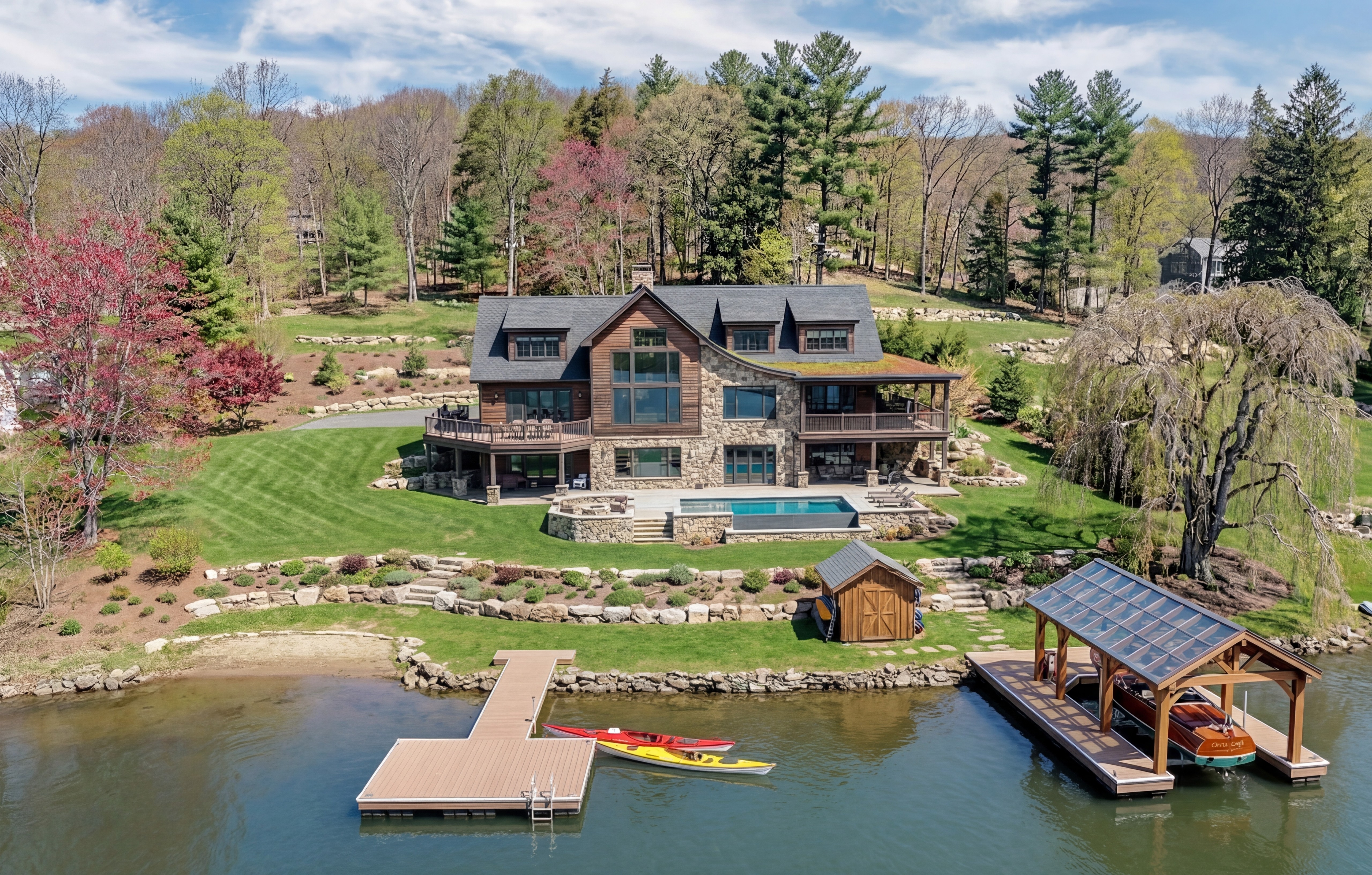 Large house on lake with dock.