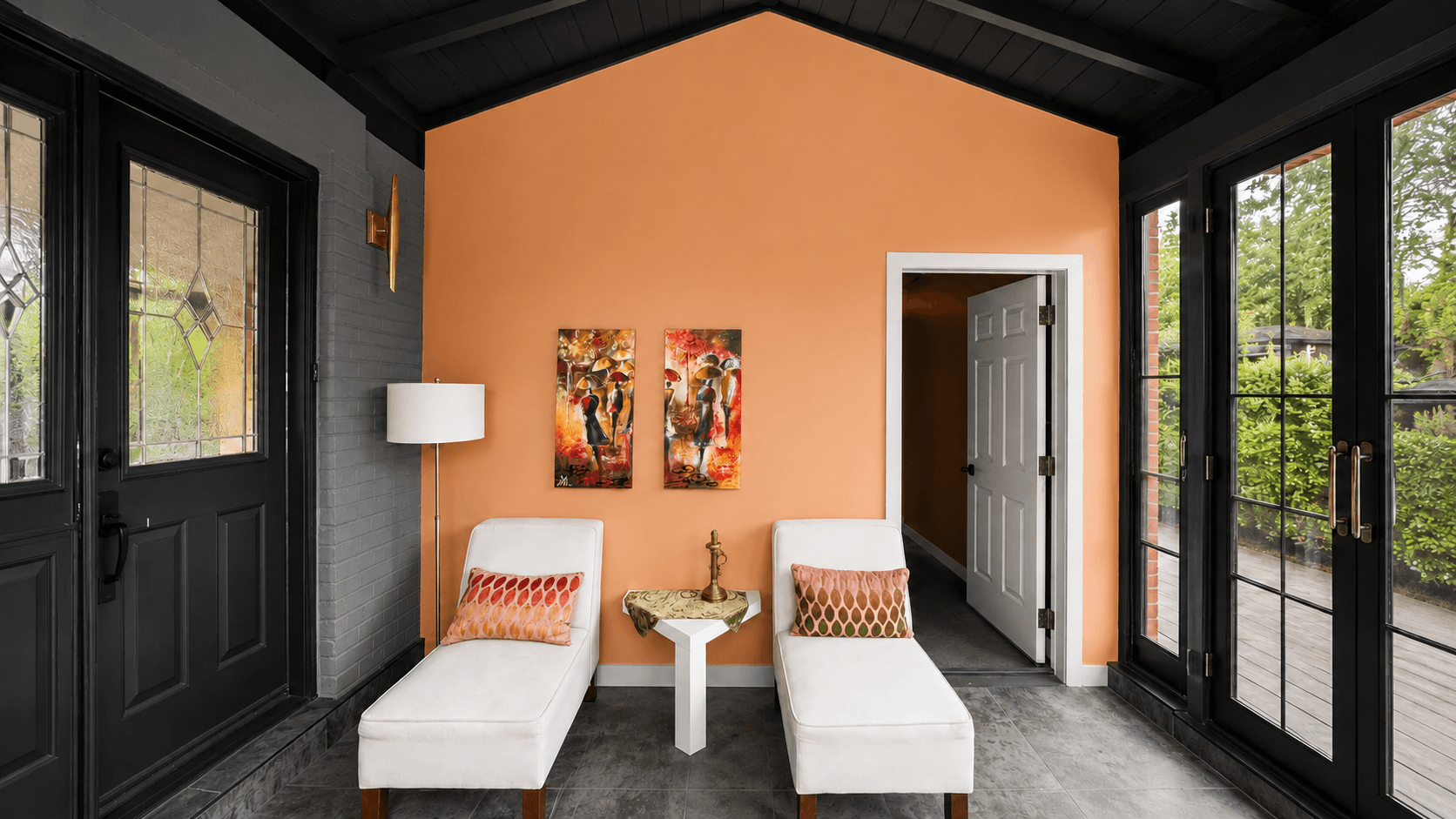 Enclosed entry with terracotta feature wall and charcoal trim