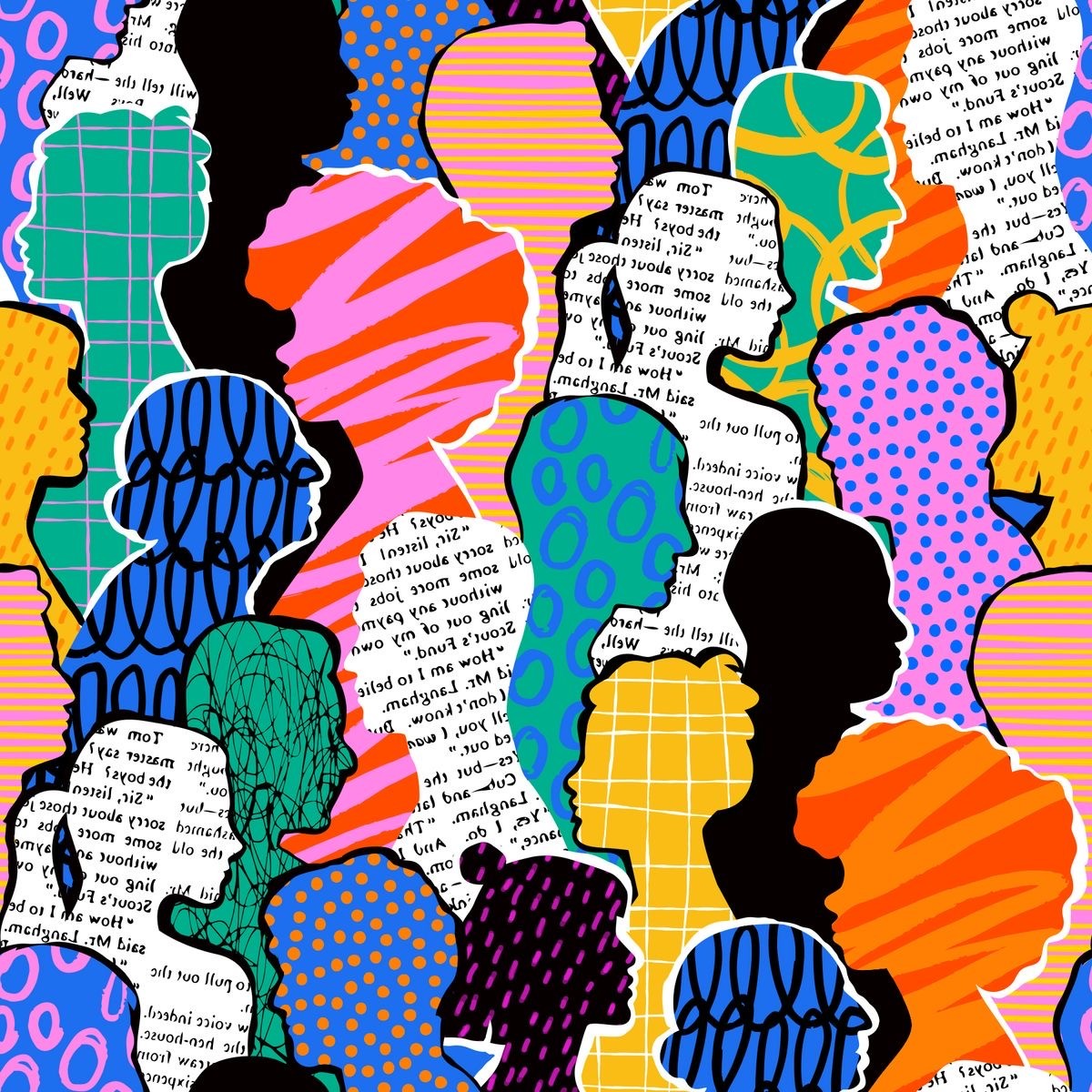 woman sitting around table holding tablet