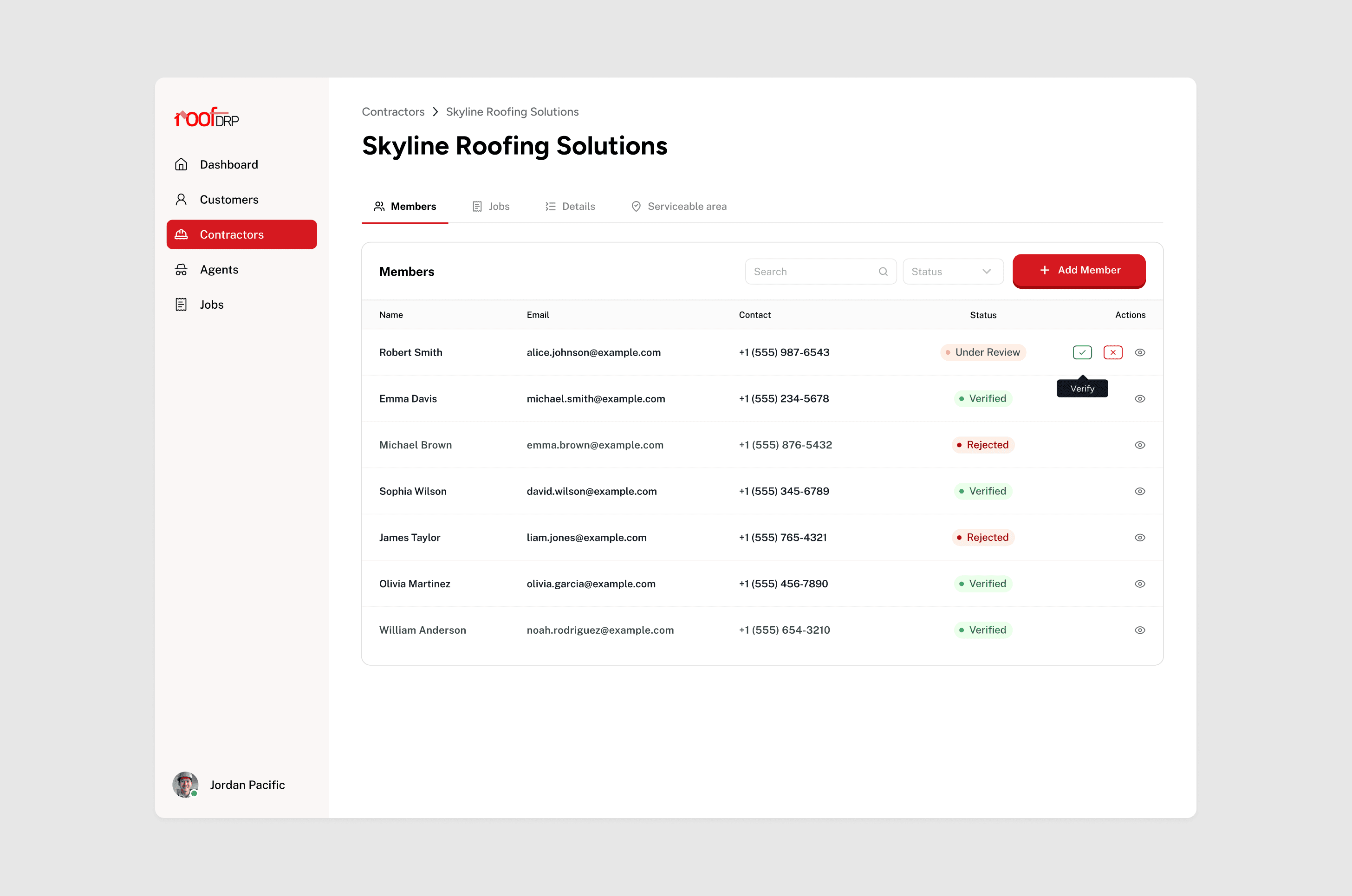 Modern home office setup with a monitor, ergonomic chair, keyboard, and indoor plants near a window with blinds.