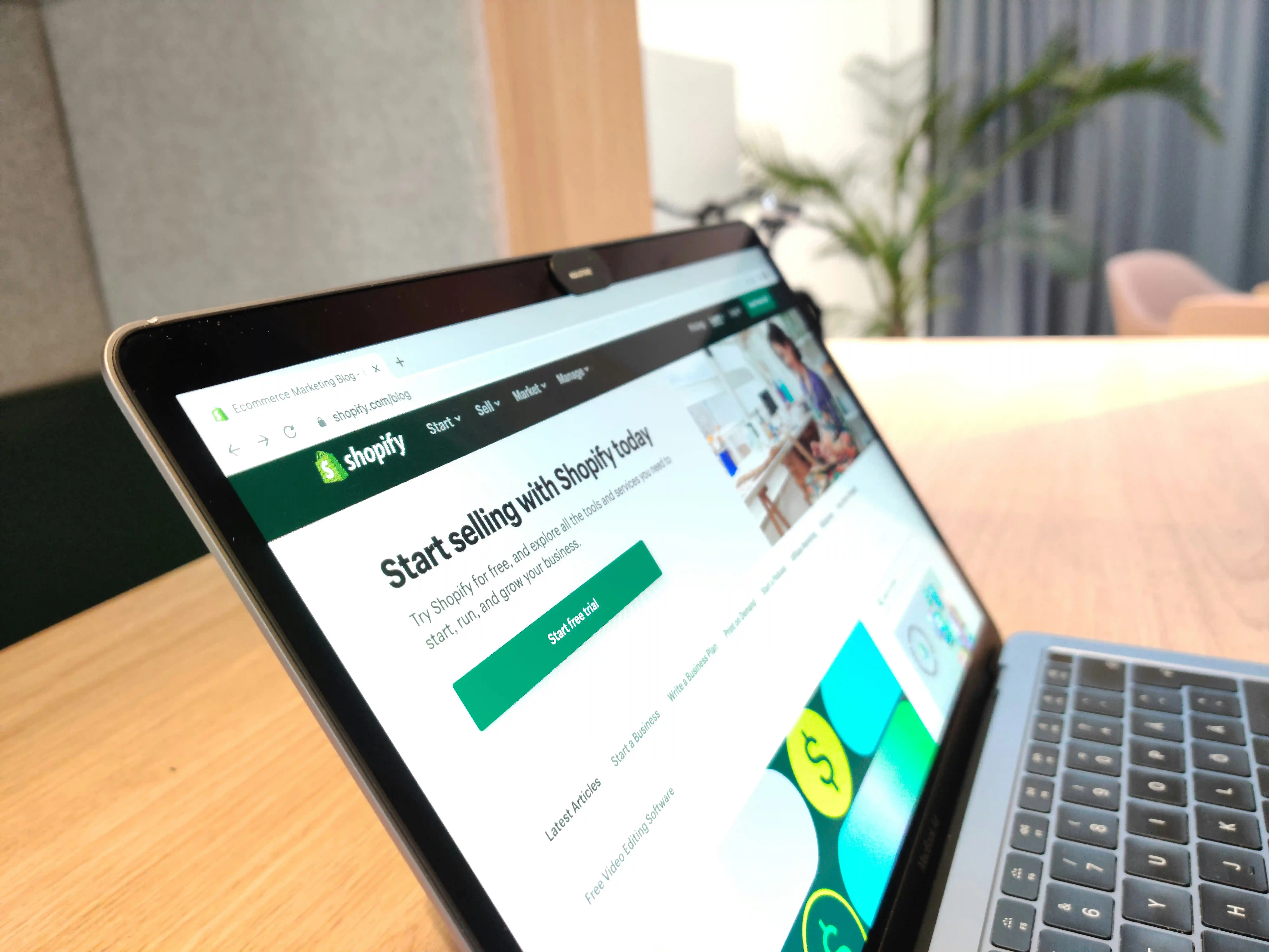 a close-up of a shopify store front on a laptop