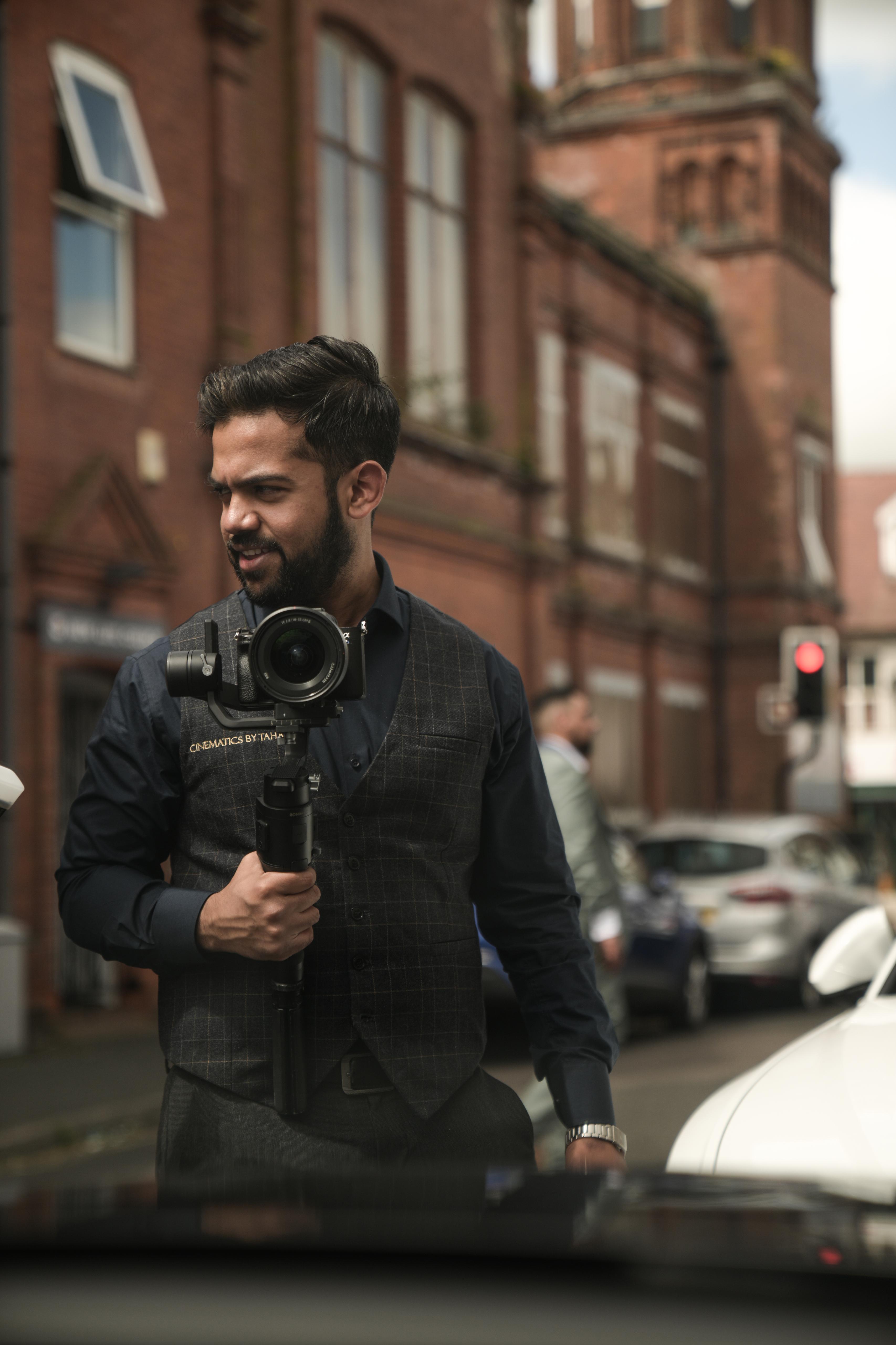 Taha photographing