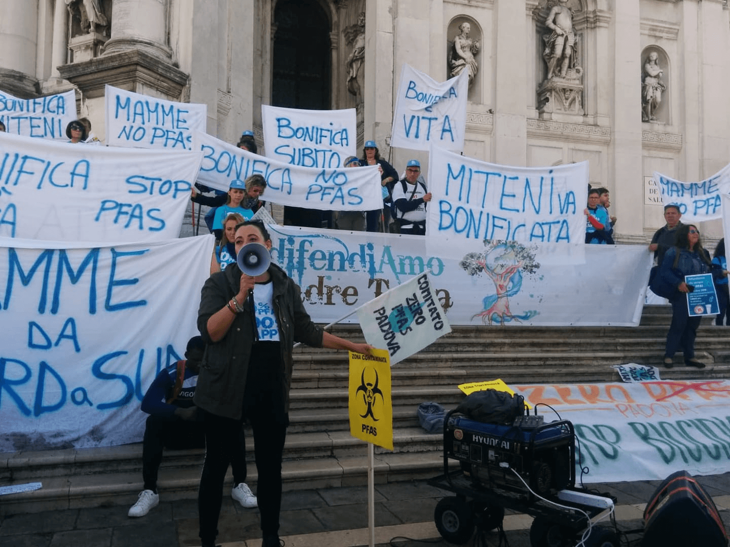 a person stacking coins on top of a table
